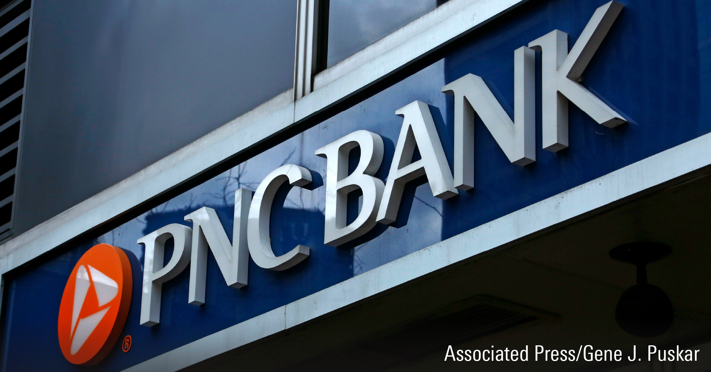 Photo shows sign for a PNC Bank in Pittsburgh.