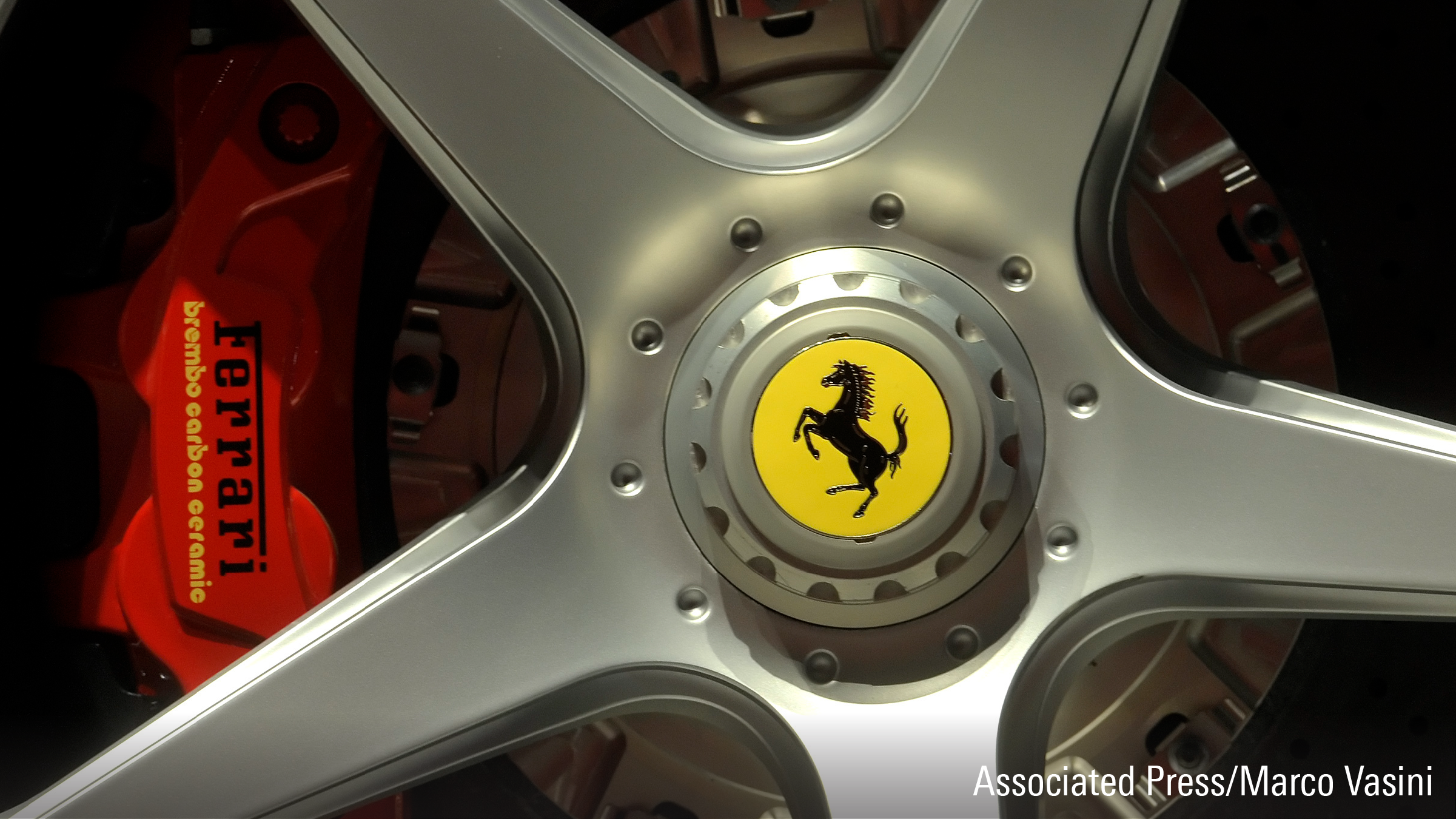 A Ferrari logo is displayed on a wheel in the department Ferrari factory in Maranello, Italy.