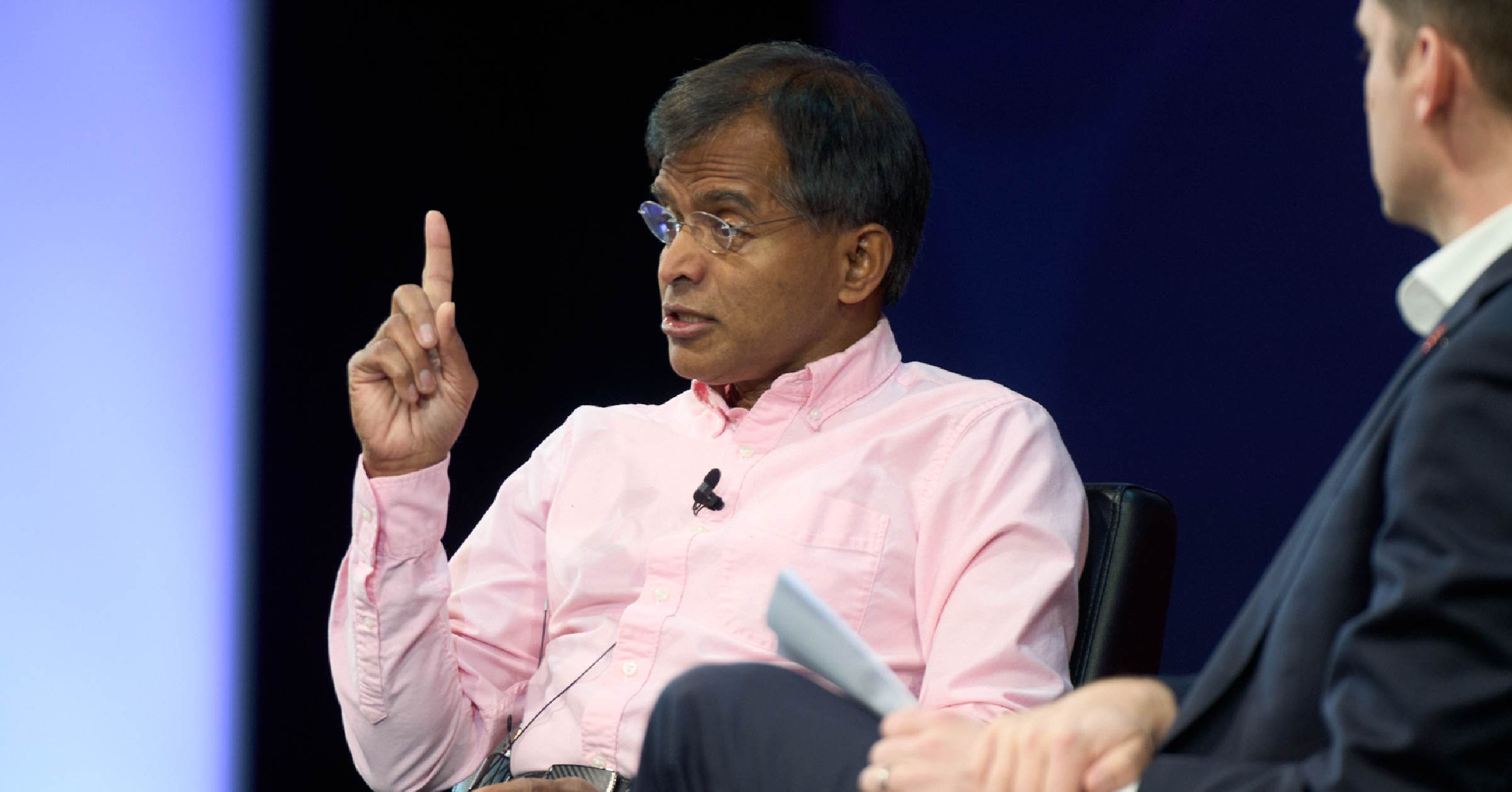 Aswath Damodaran and Adam Fleck on stage at the 2023 Morningstar Investment Conference.