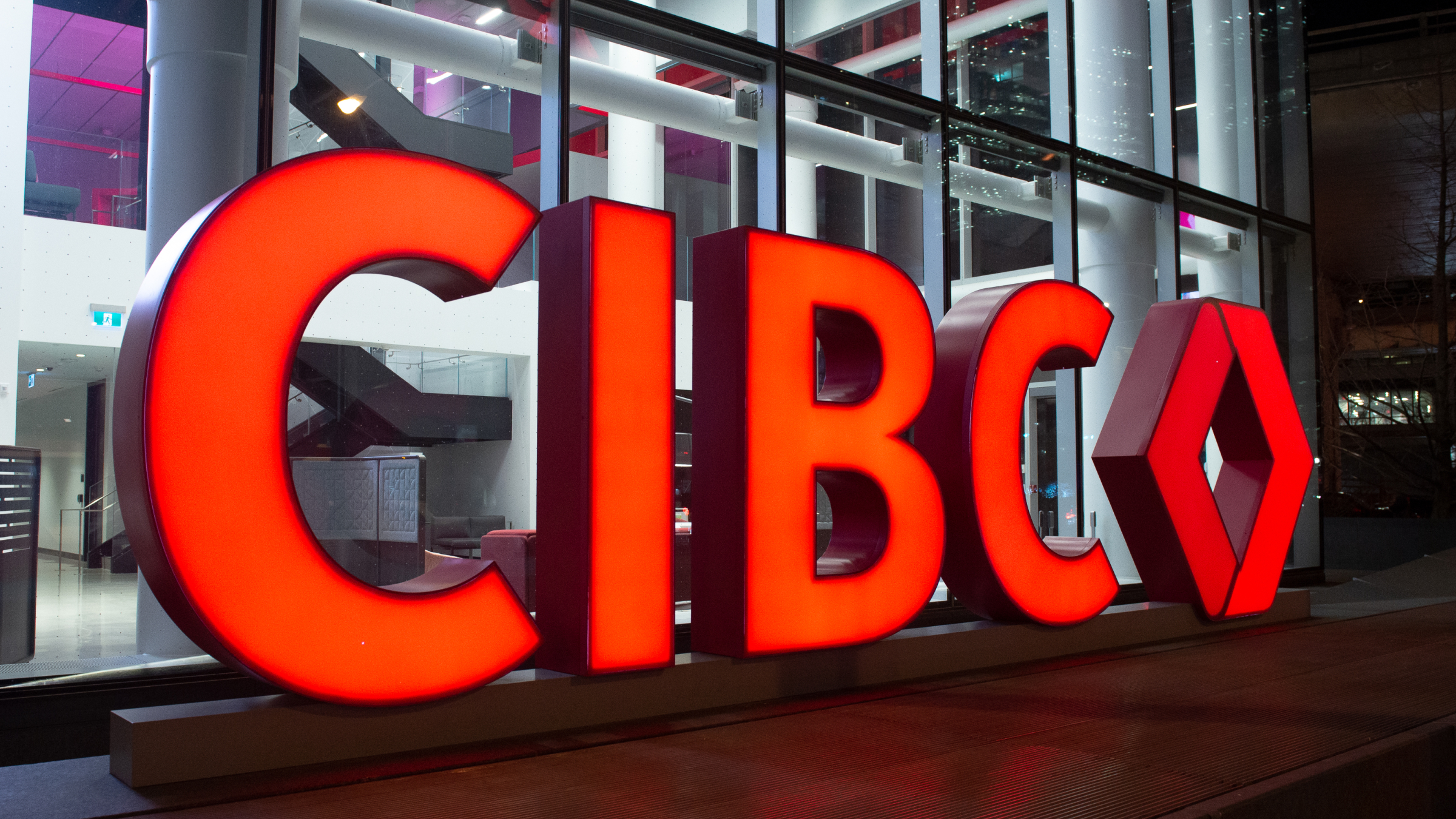 Close-up of CIBC sign on a building.