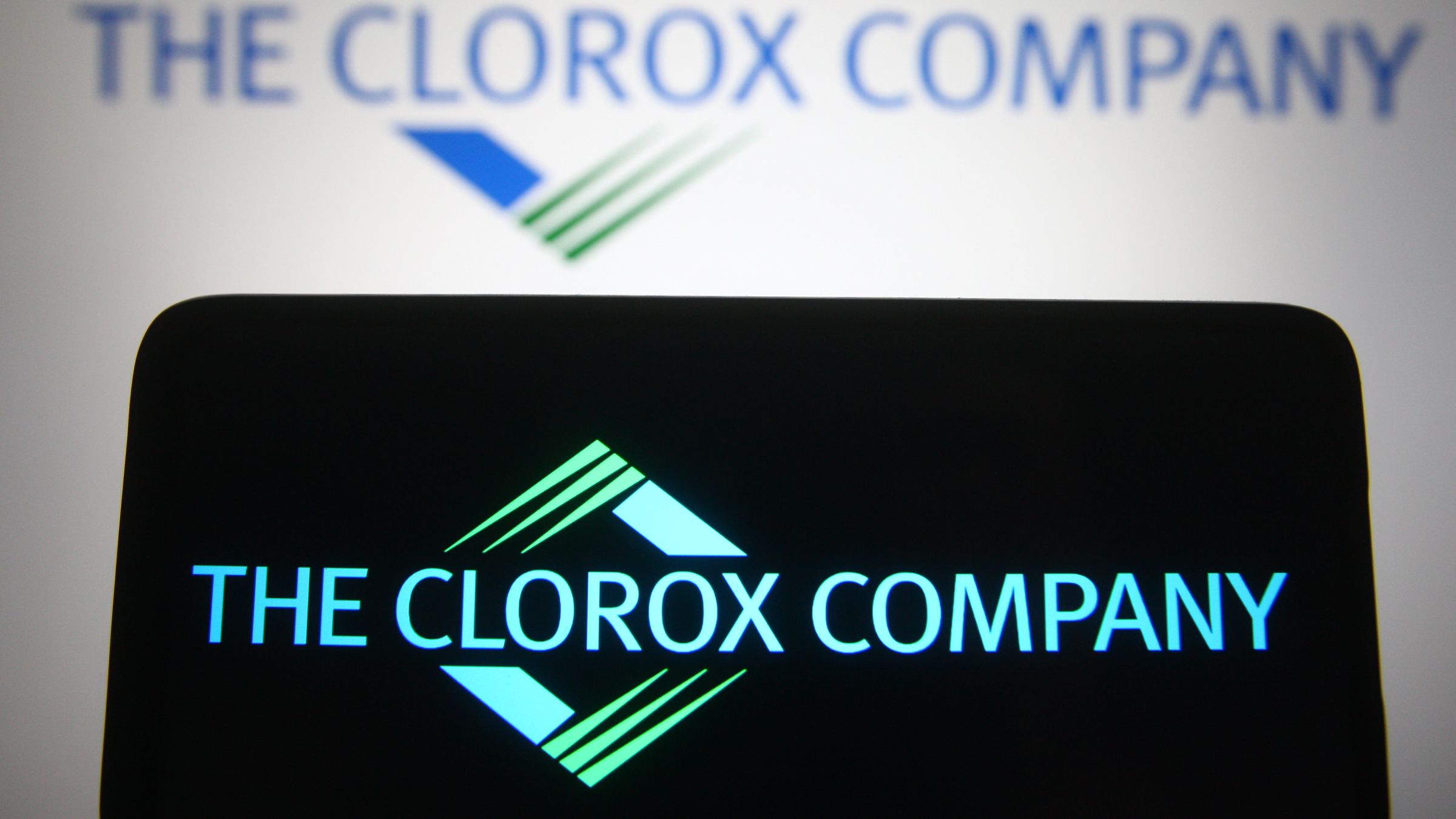 The Clorox Company logo is seen on a smartphone and a pc screen.