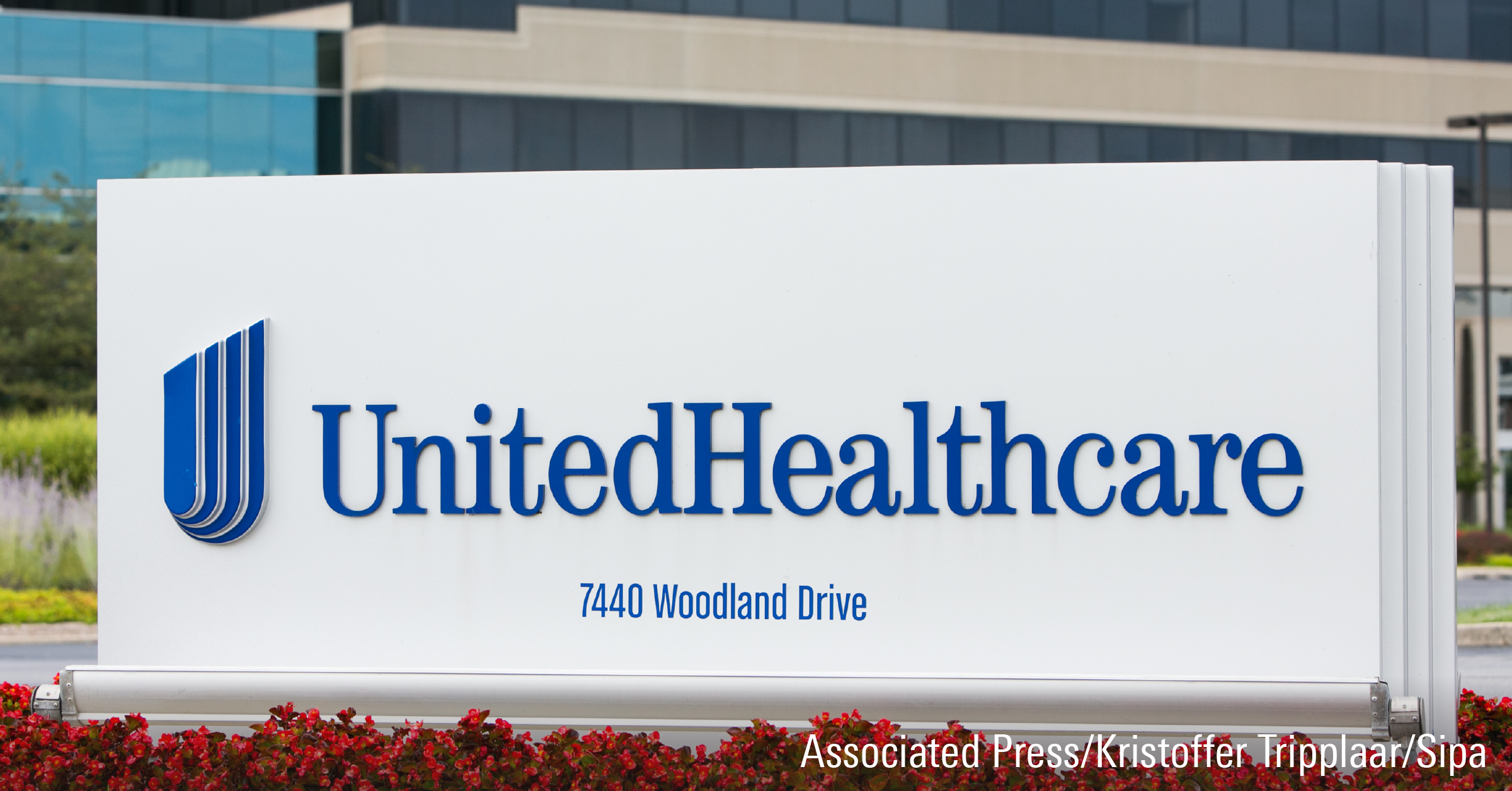A logo sign outside of a facility occupied by UnitedHealthcare.