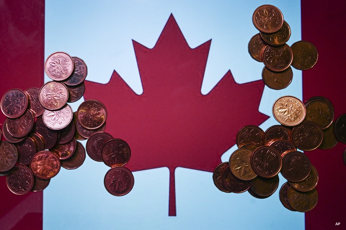 Canadian flag with pennies on top