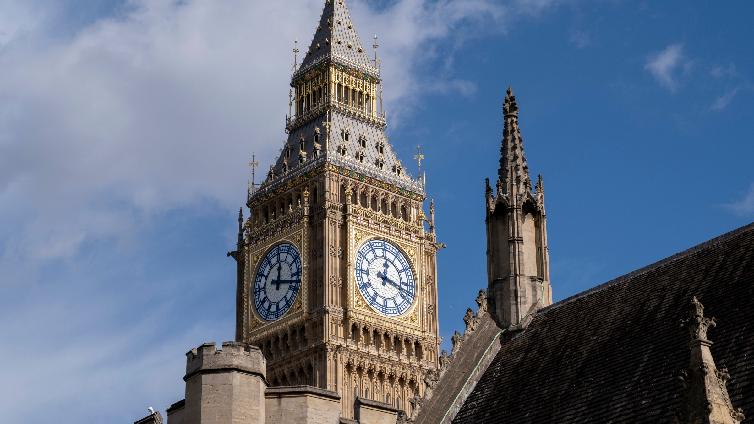 Exterior view of the Houses of Parliament, the Palace of Westminster and clock tower.