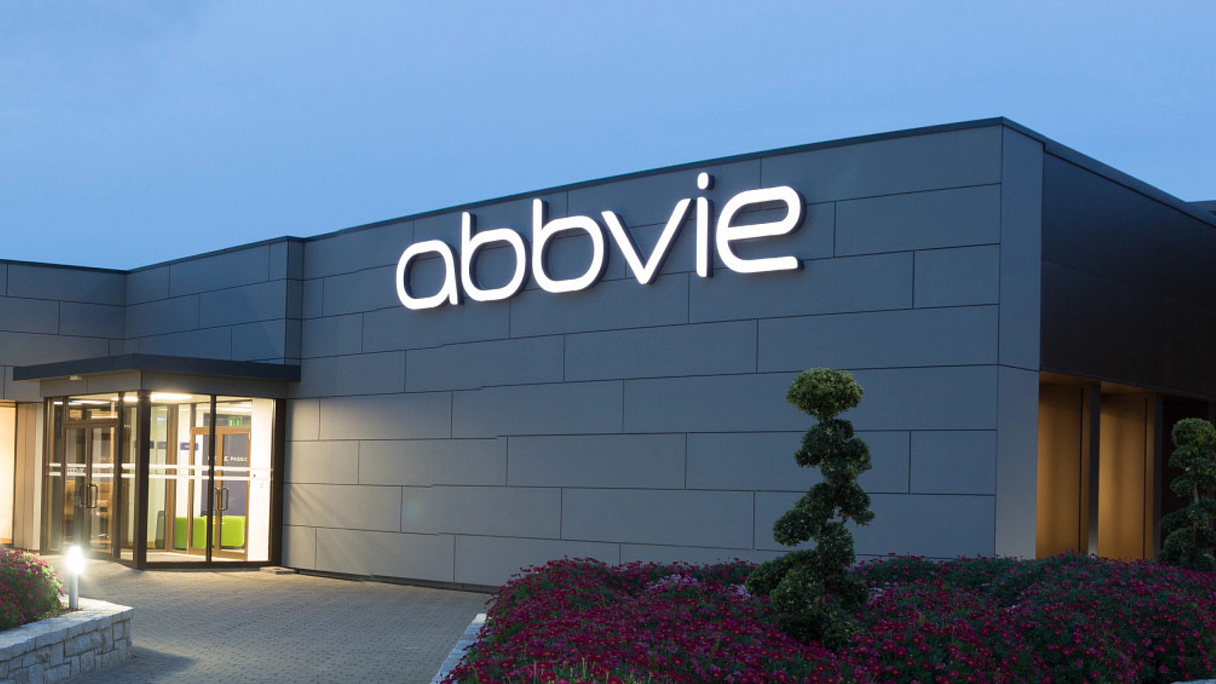 The Abbvie logo and signage is displayed on a building.