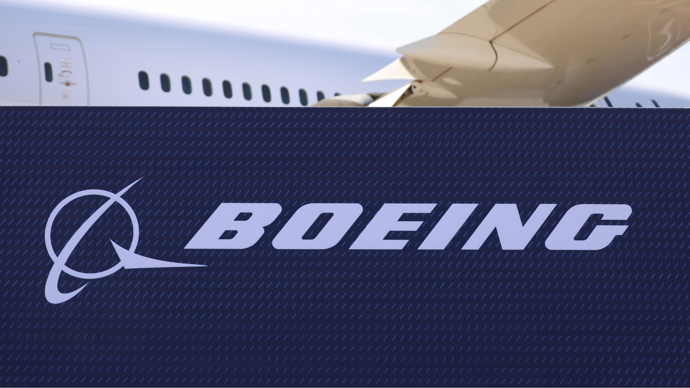 The Boeing logo on the exterior of a pavilion booth.