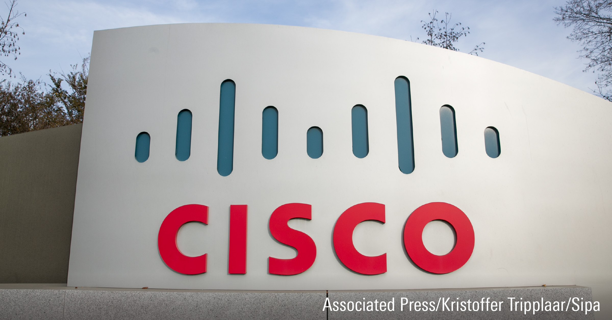 A logo sign outside of a facility occupied by Cisco Systems, Inc.