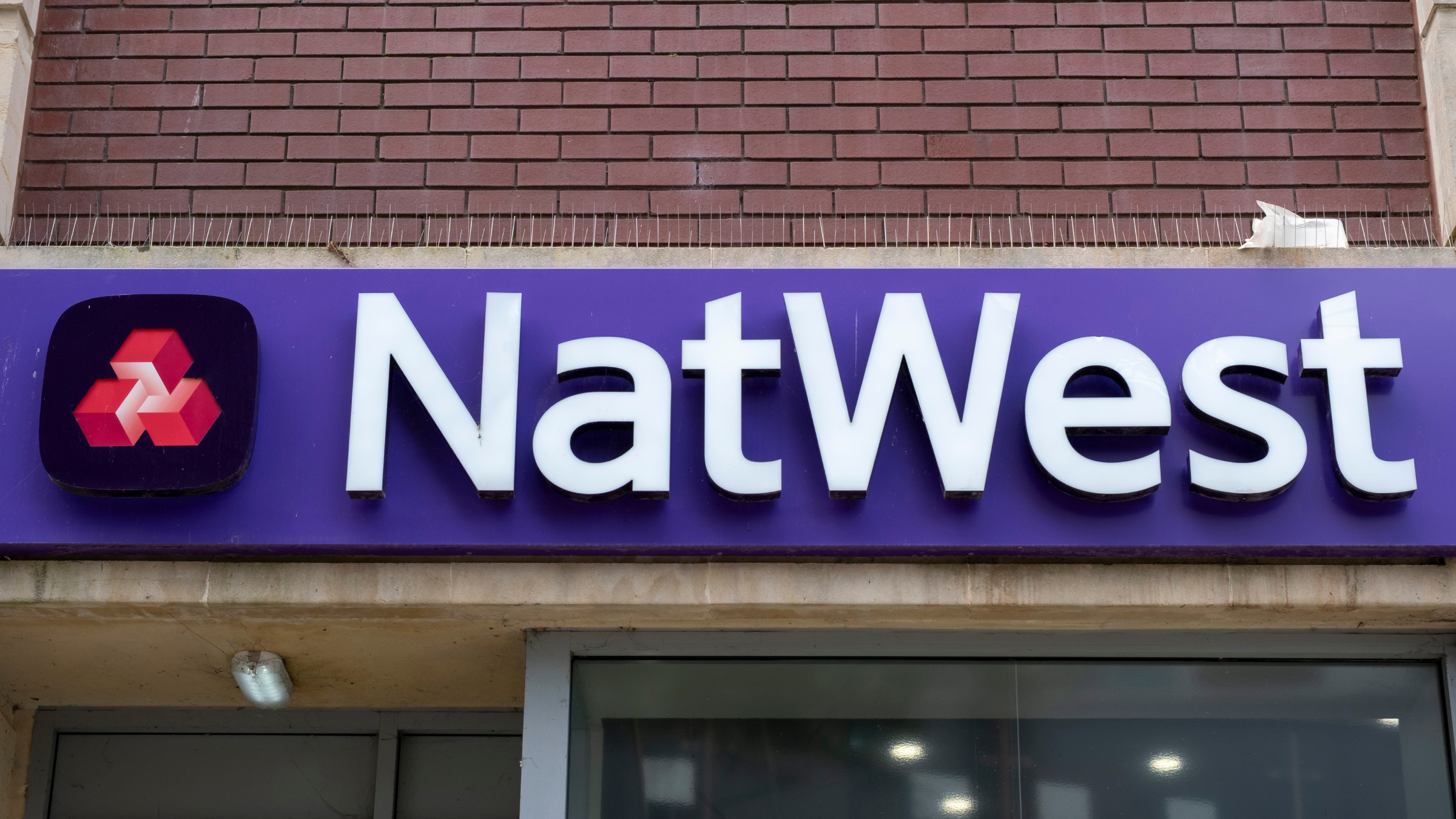 NatWest logo on bank exterior.