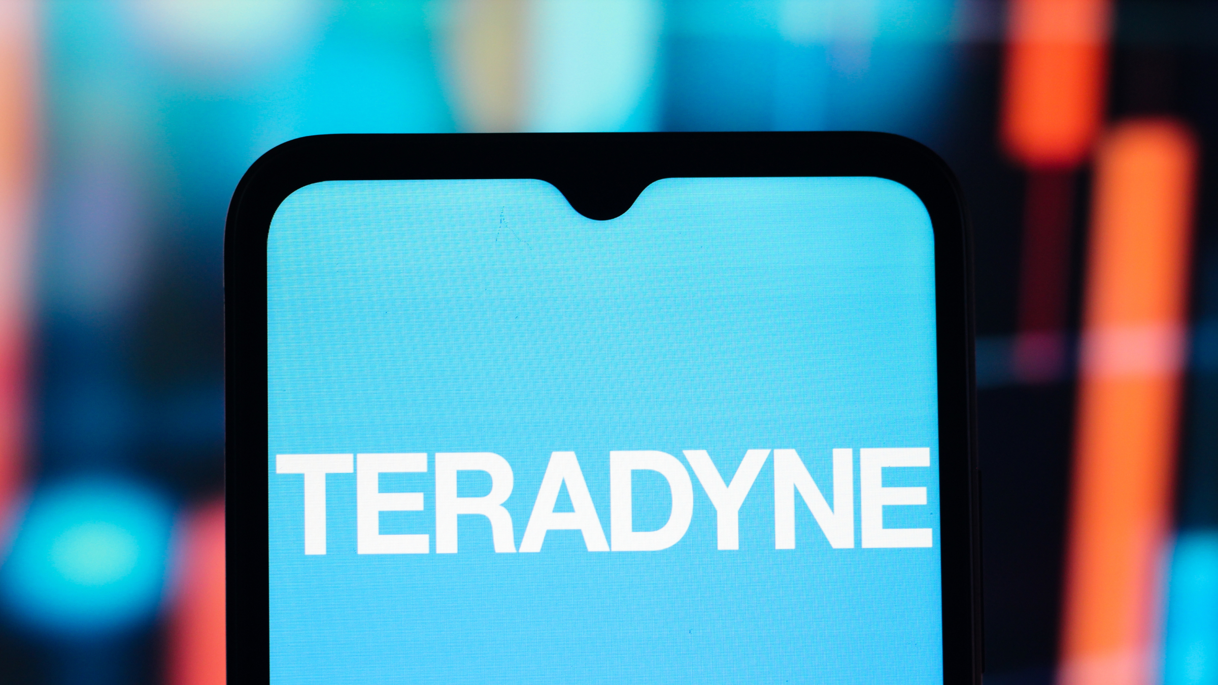 The Teradyne logo is seen displayed on a smartphone screen.