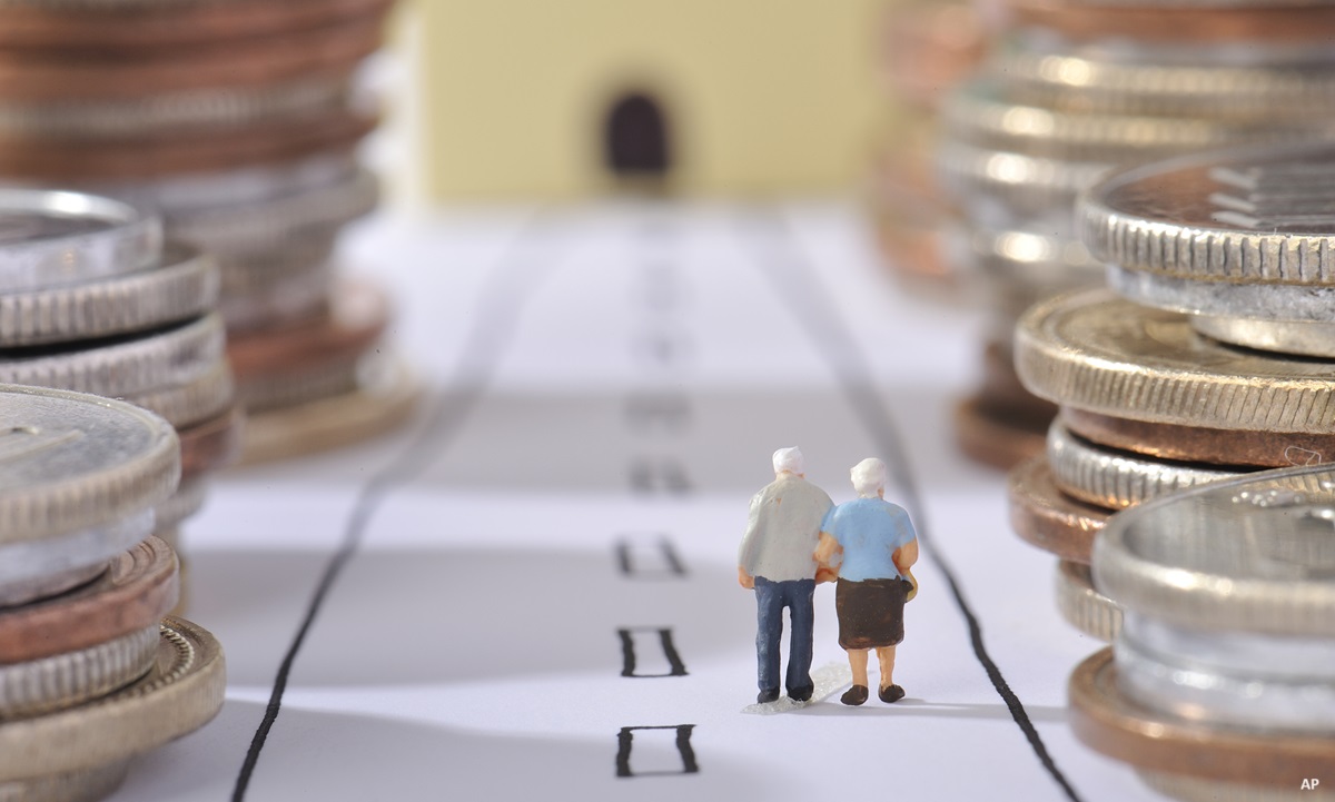 Retired couple walking down a road