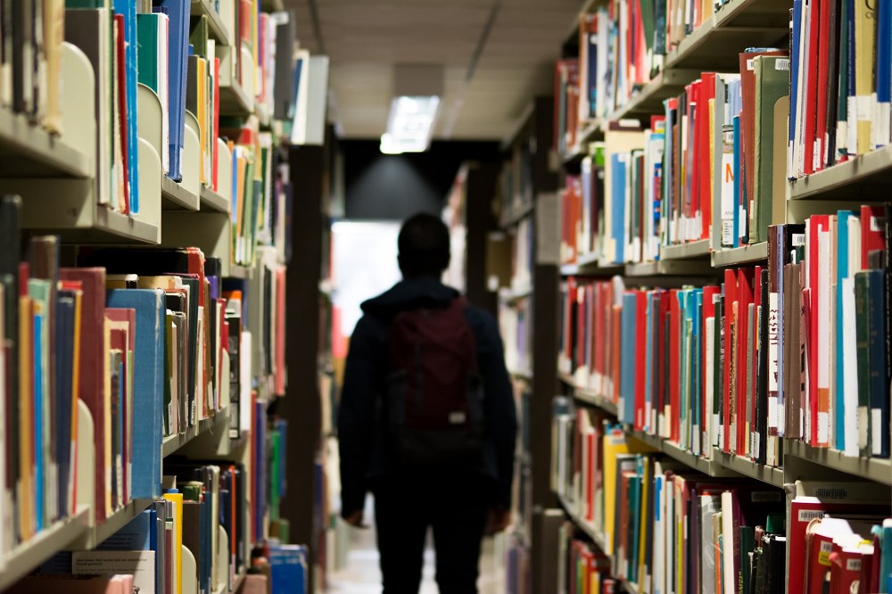 Dark library aisle
