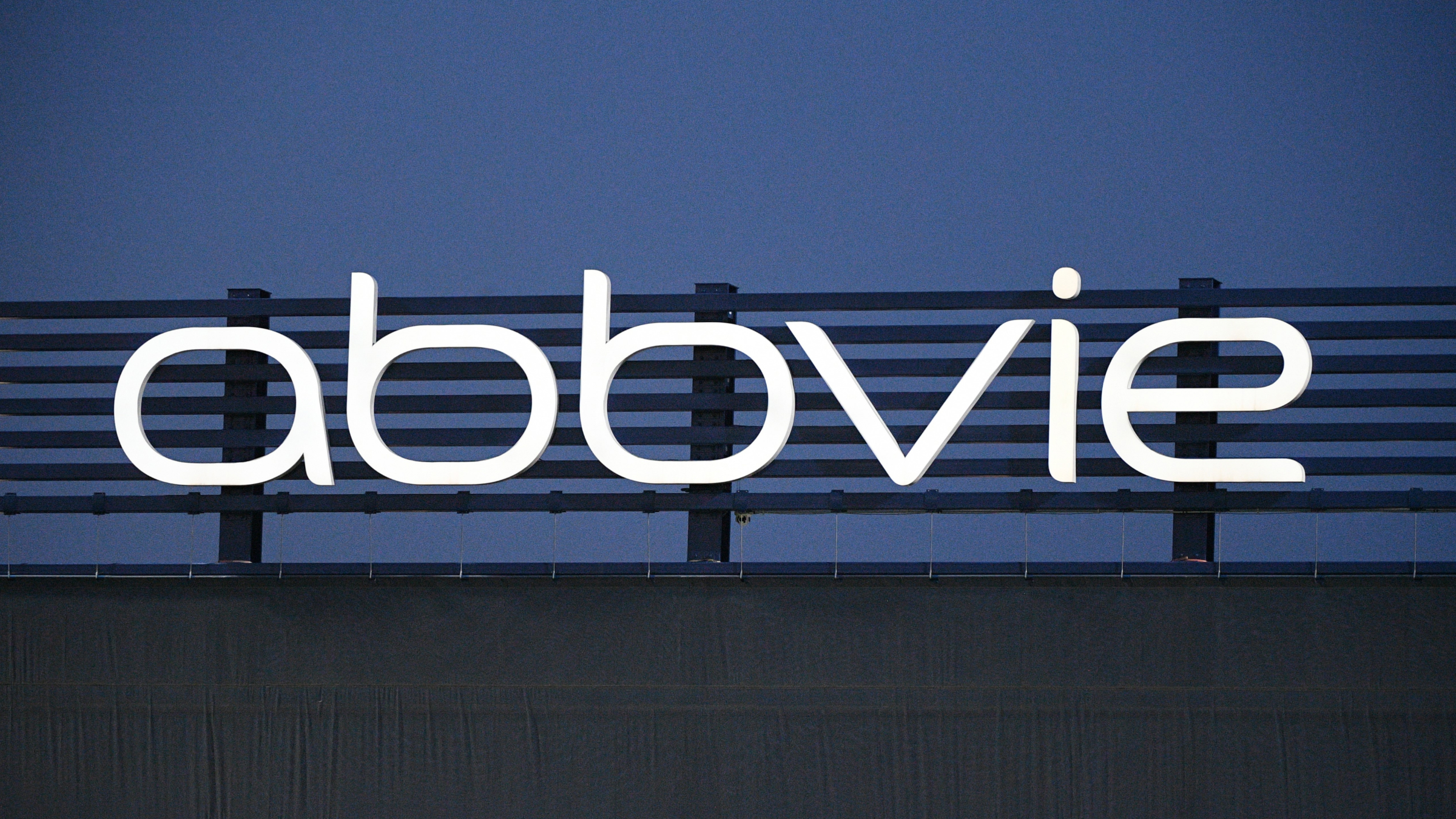 A general view of the AbbVie logo on a sign.