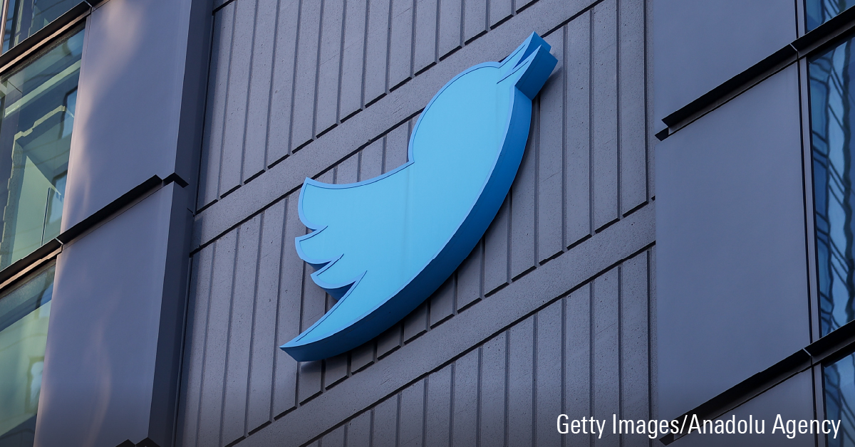 Twitter logo sign displayed on headquarters building in San Francisco, California.