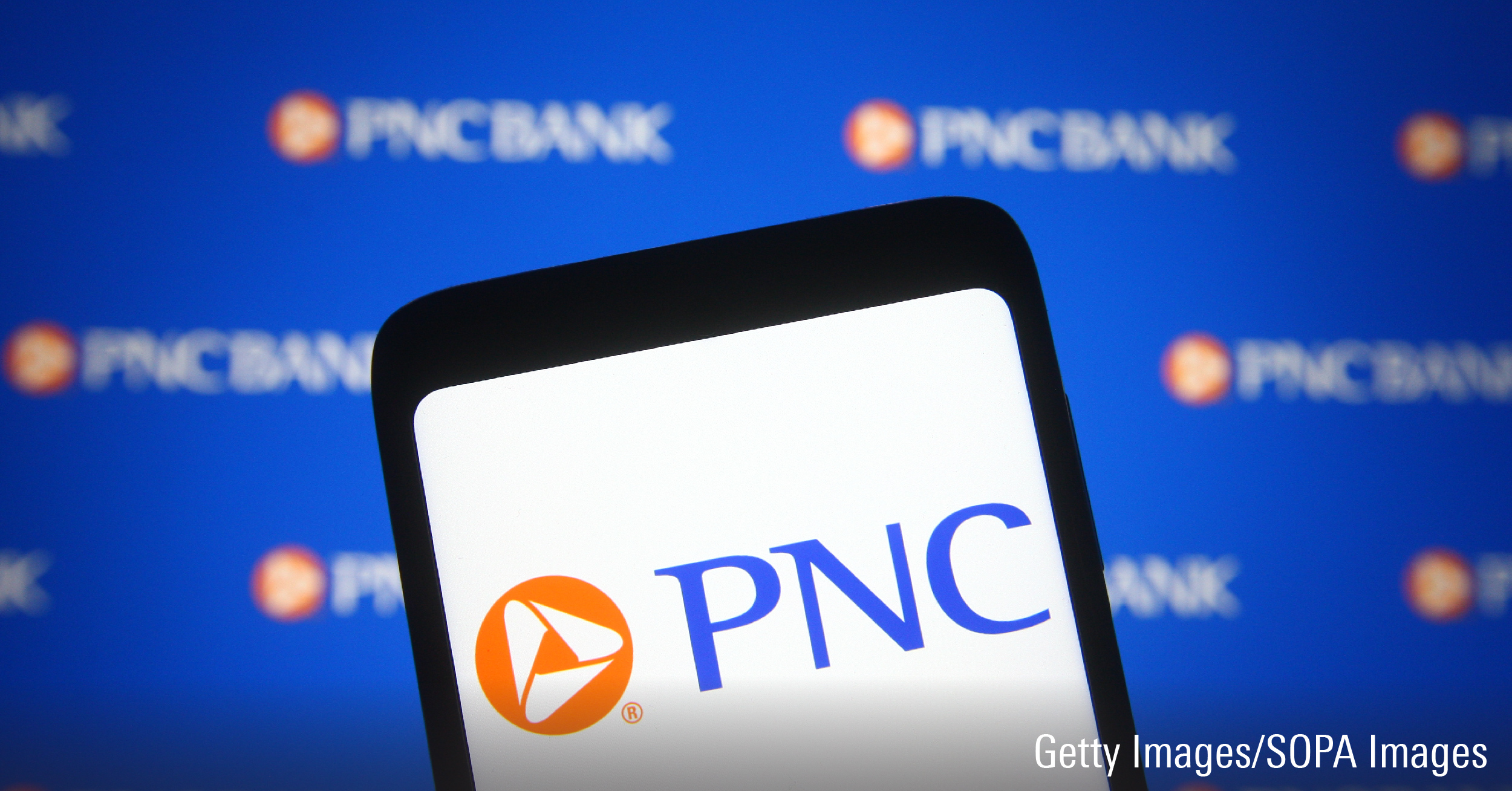 In this photo illustration a PNC Financial Services Group, Inc. (PNC) logo of a bank holding company is seen on a smartphone screen.