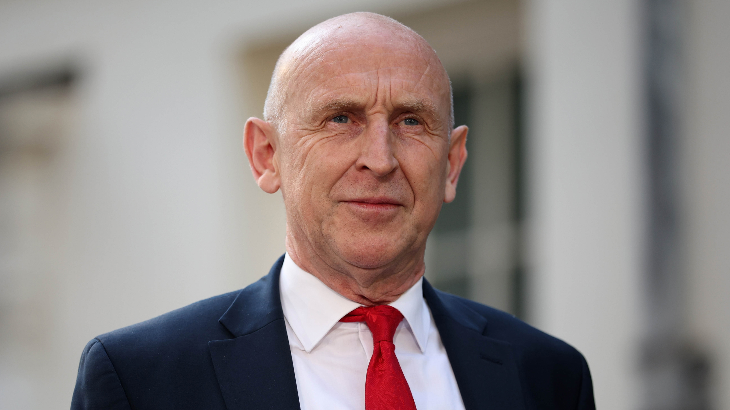 John Healey leaves Downing Street in London, England.