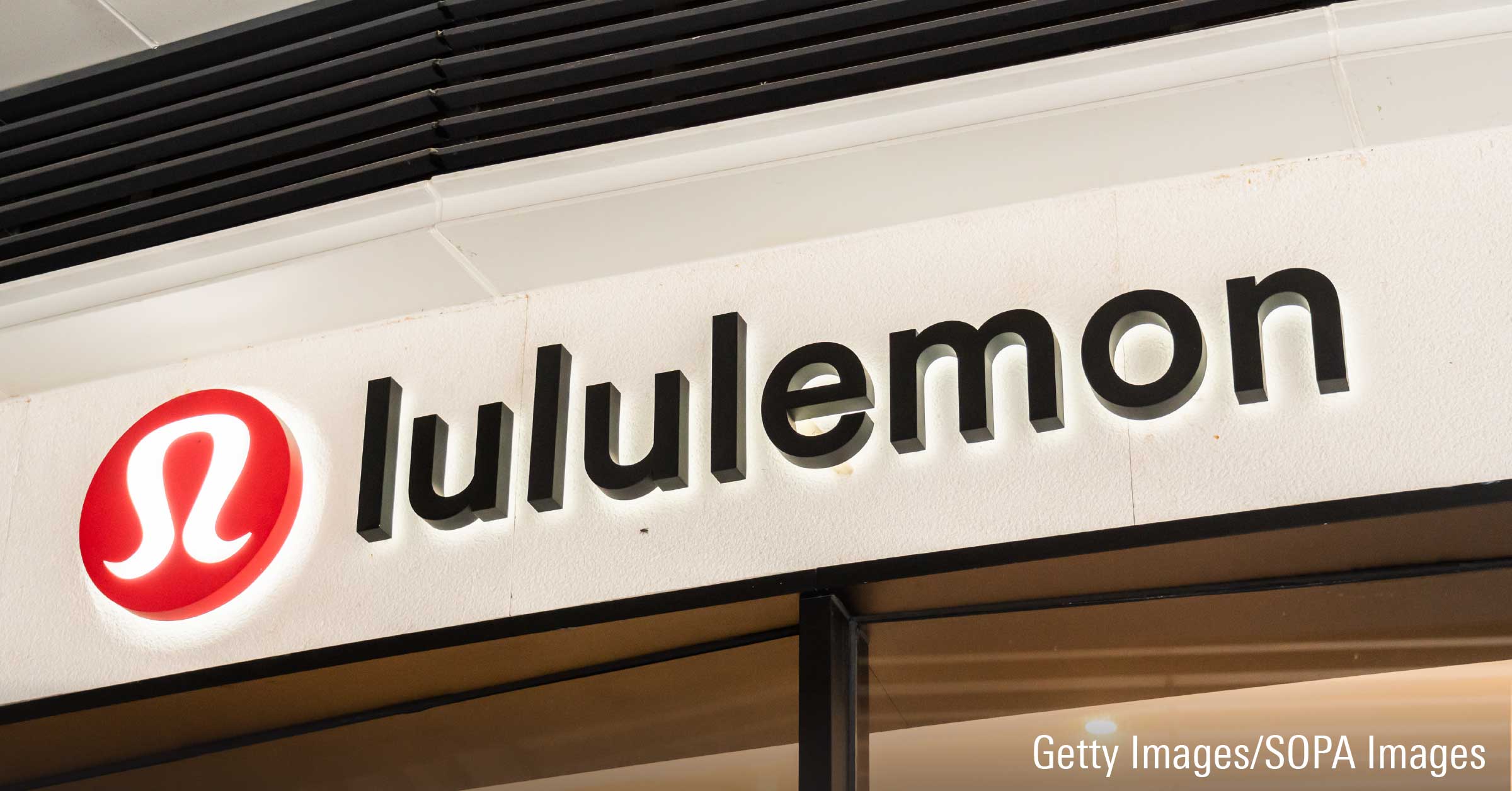 Lululemon logo sign displayed on a storefront