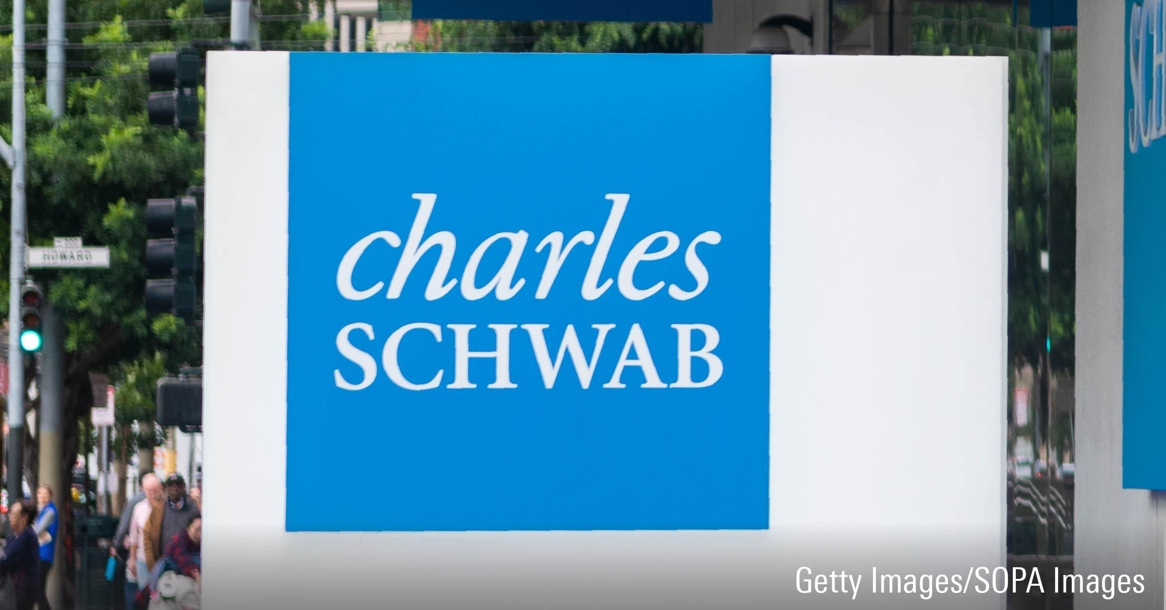 Charles Schwab logo on sign.
