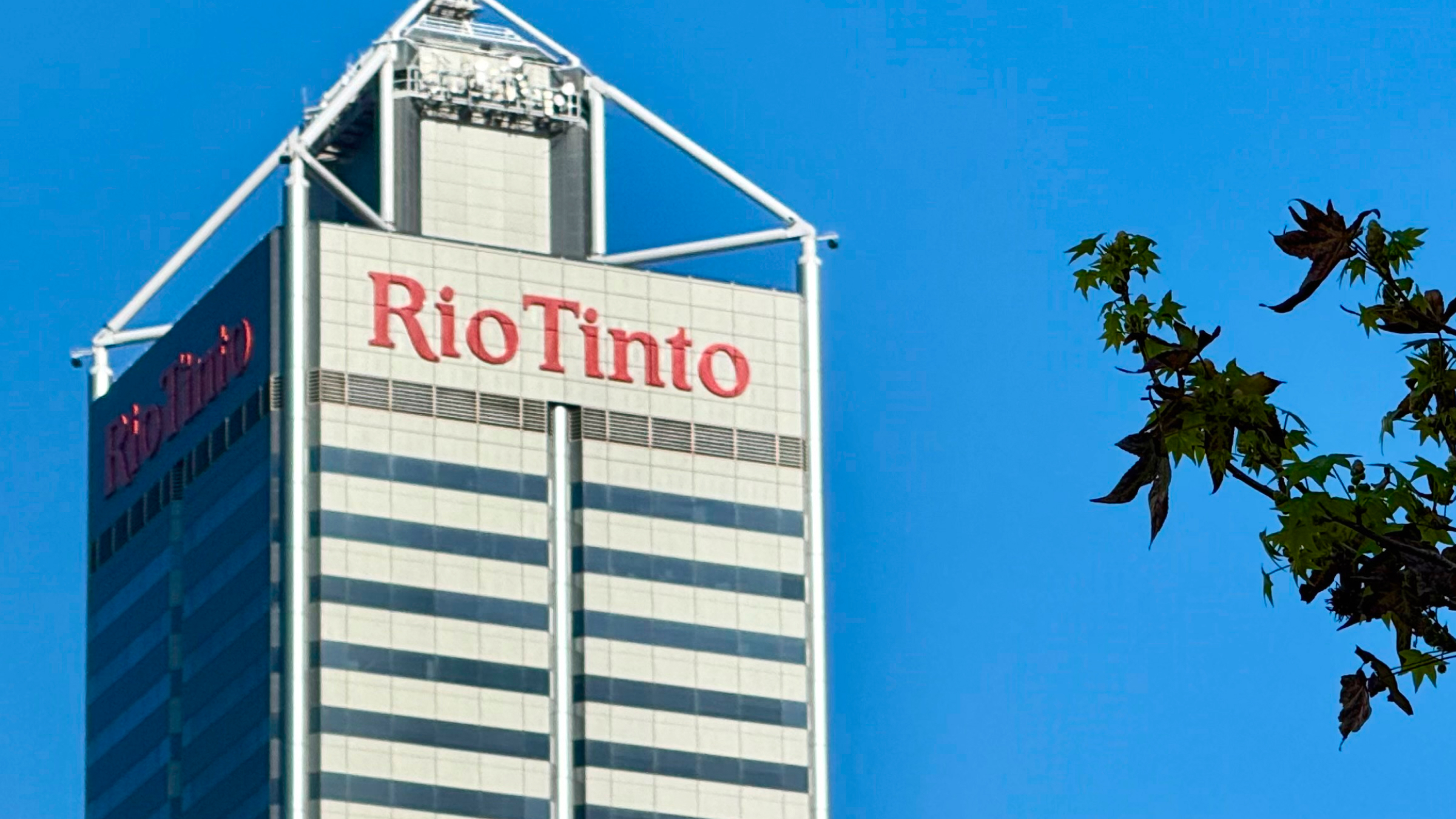 The Rio Tinto logo on a high-rise building.