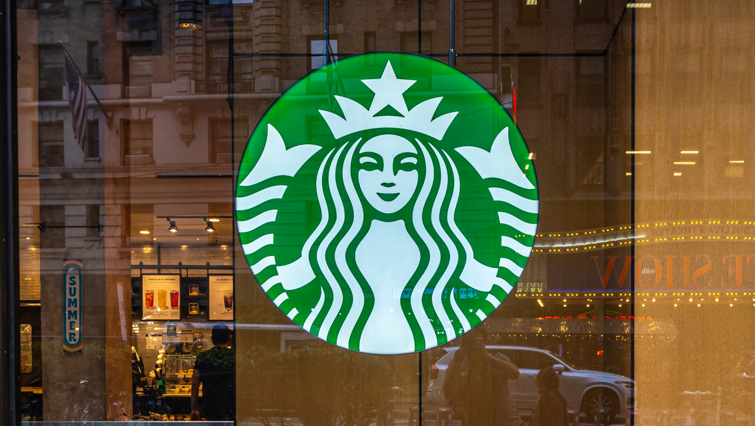 A store front of a Starbucks Coffee shop.