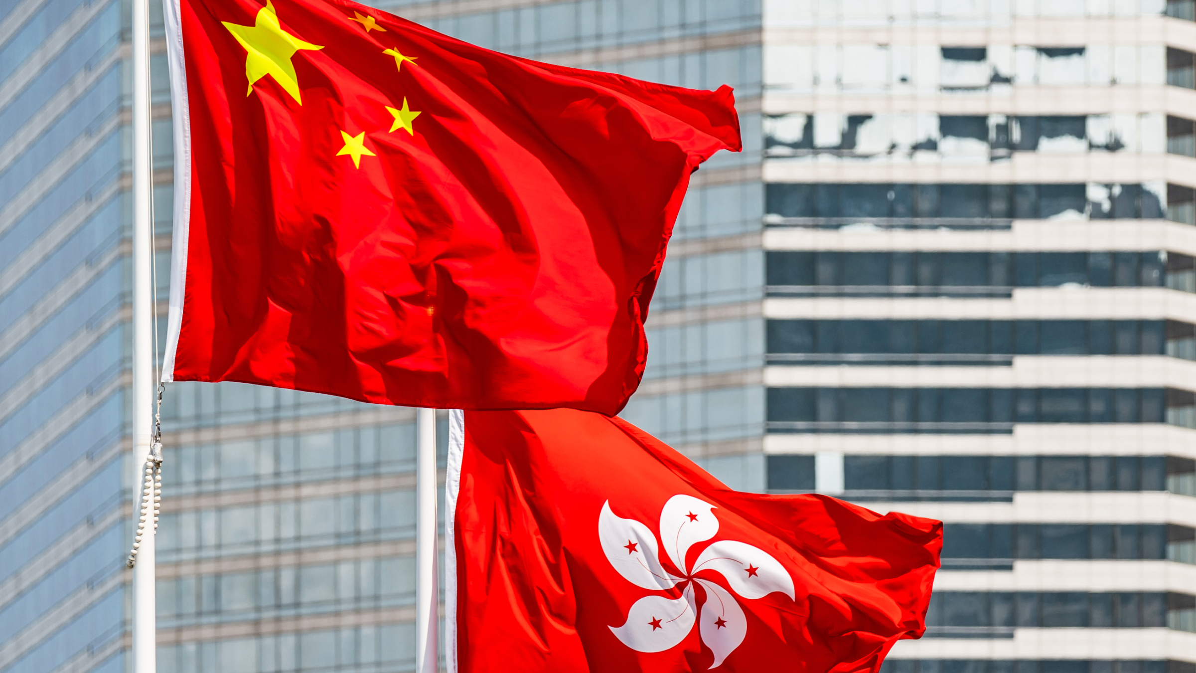 Buildings with Hong Kong and China flags
