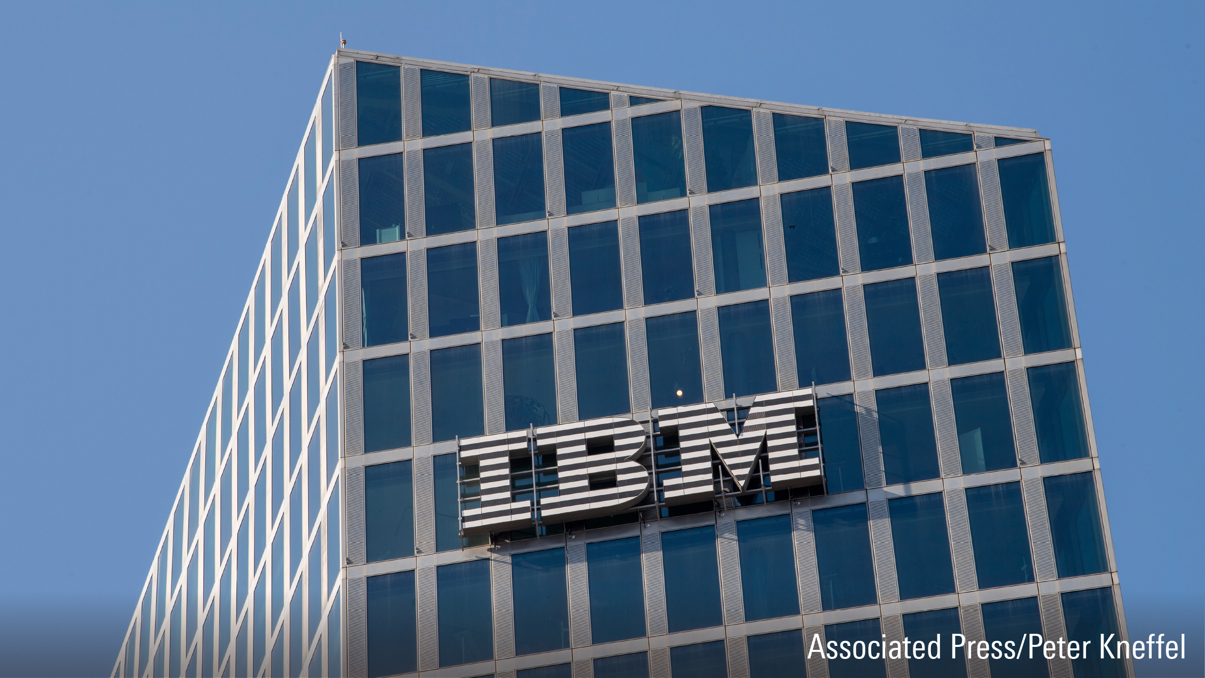 The IBM logo hangs on the facade of an office building in Parkstadt Schwabing, in the north of the Bavarian capital