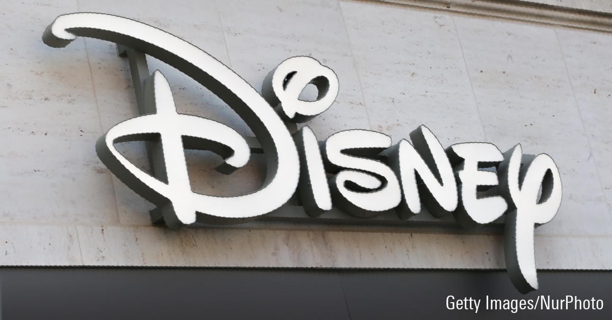 The logo of Disney is seen on building.