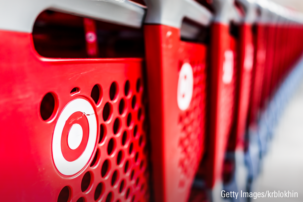 A row of shopping carts with the Target store logo are shown stacked together