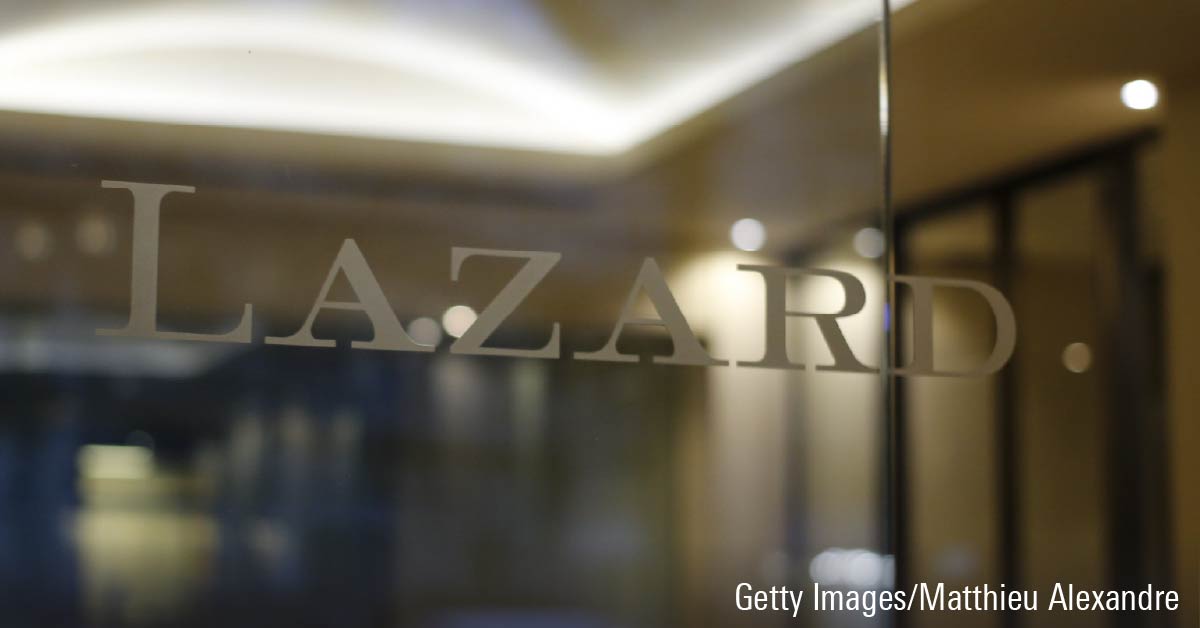 Glass door displaying the logo of financial advisory and asset management firm Lazard.