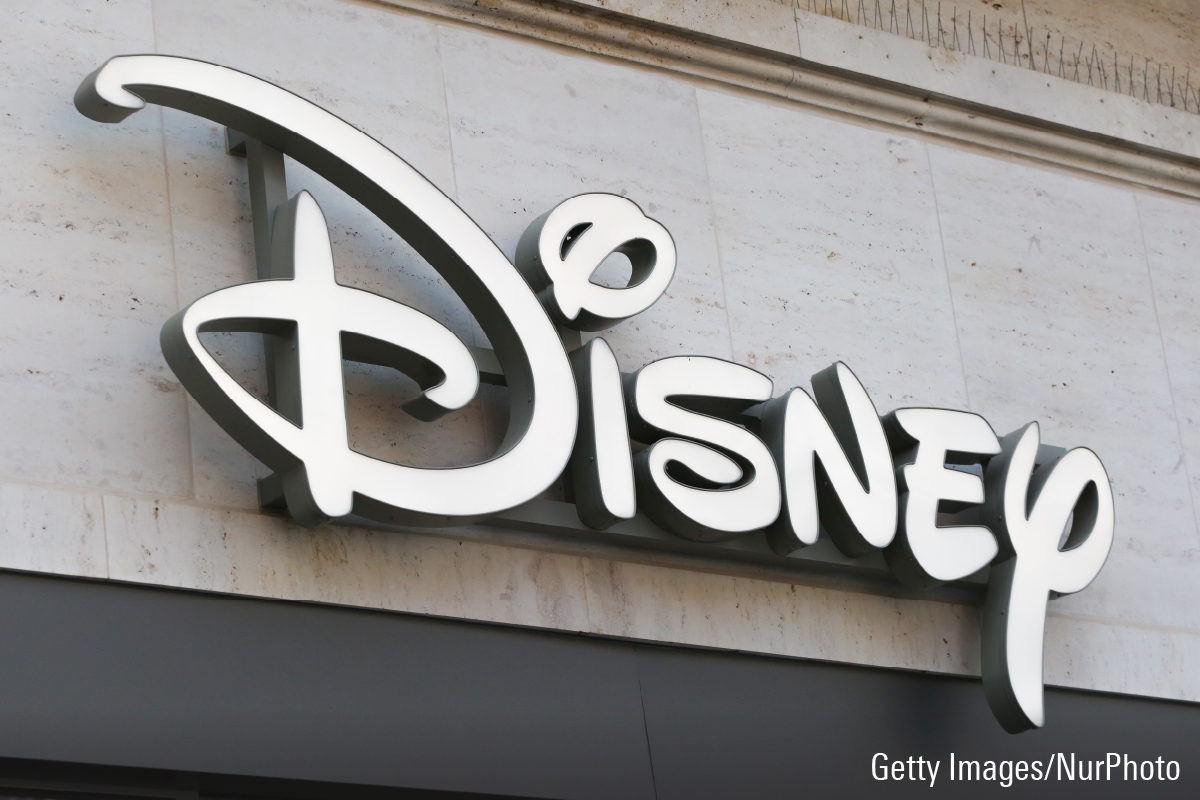 The logo of Disney is seen on building.