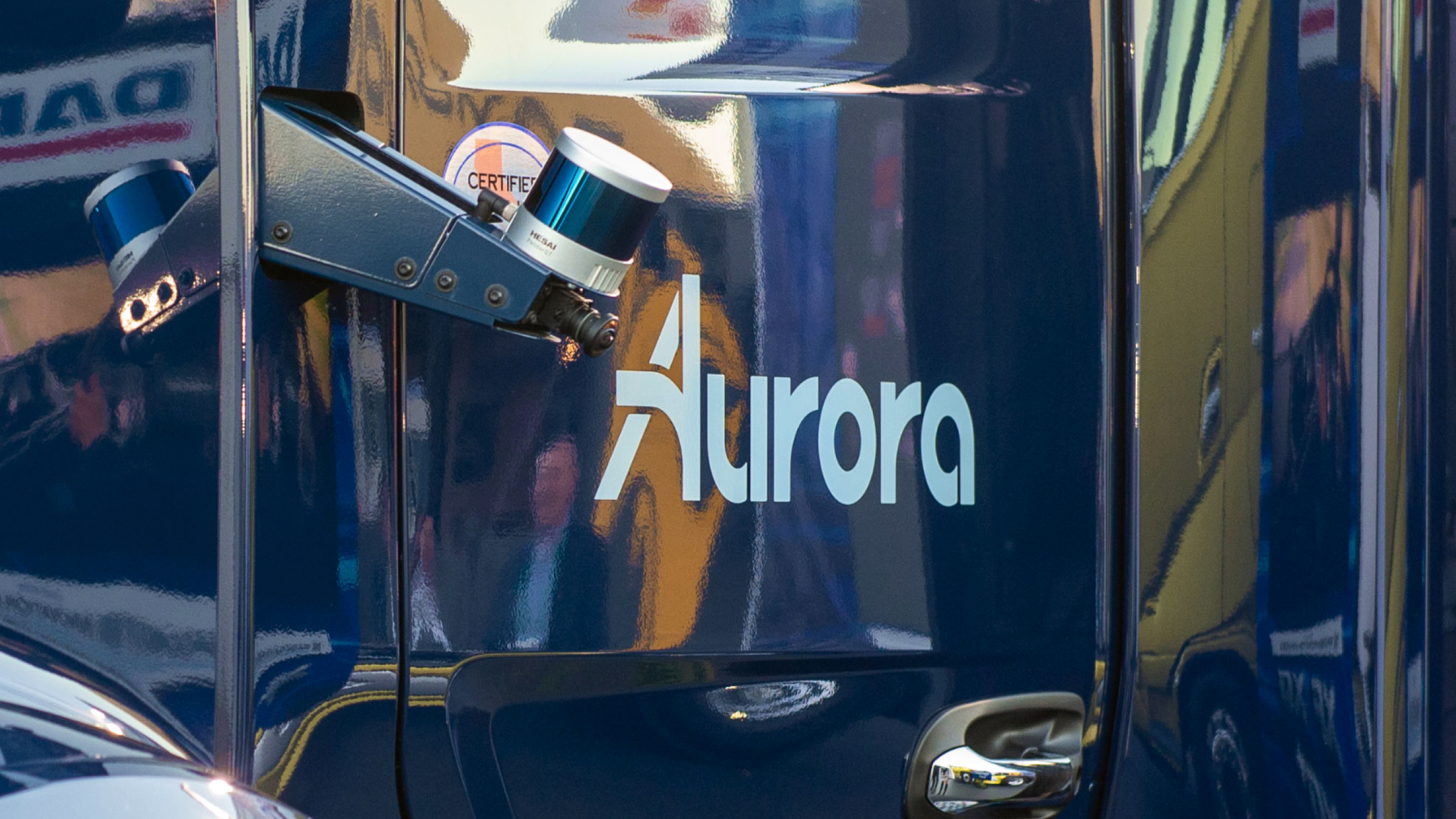 The Aurora logo on a self-driving semi-truck.