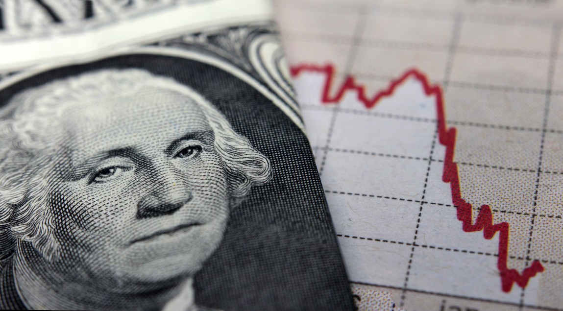 Stock Market Graph next to a 1 dollar bill (showing former president Washington). Red trend line indicates the stock market recession period