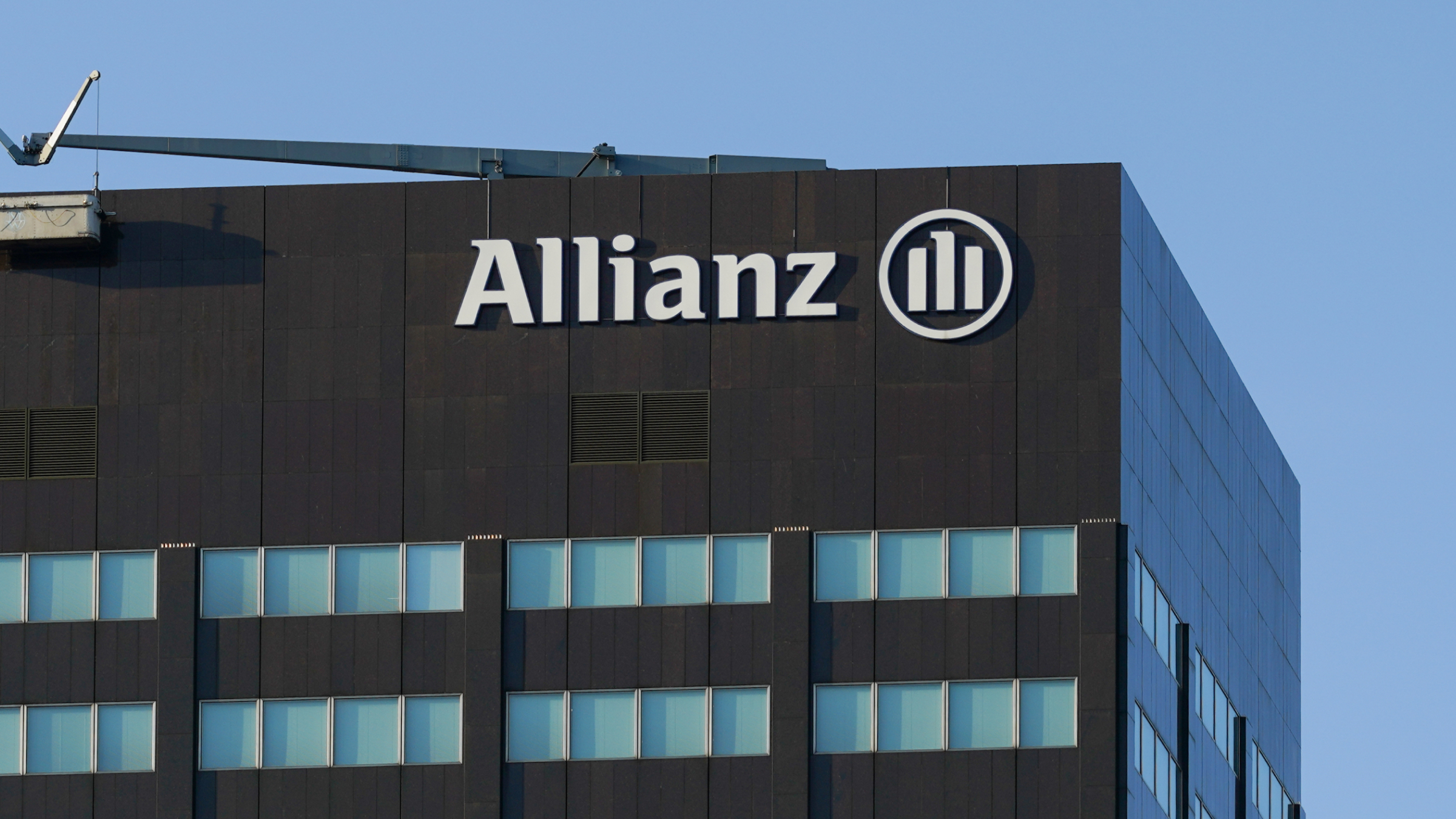 The Allianz office tower with the company logo.
