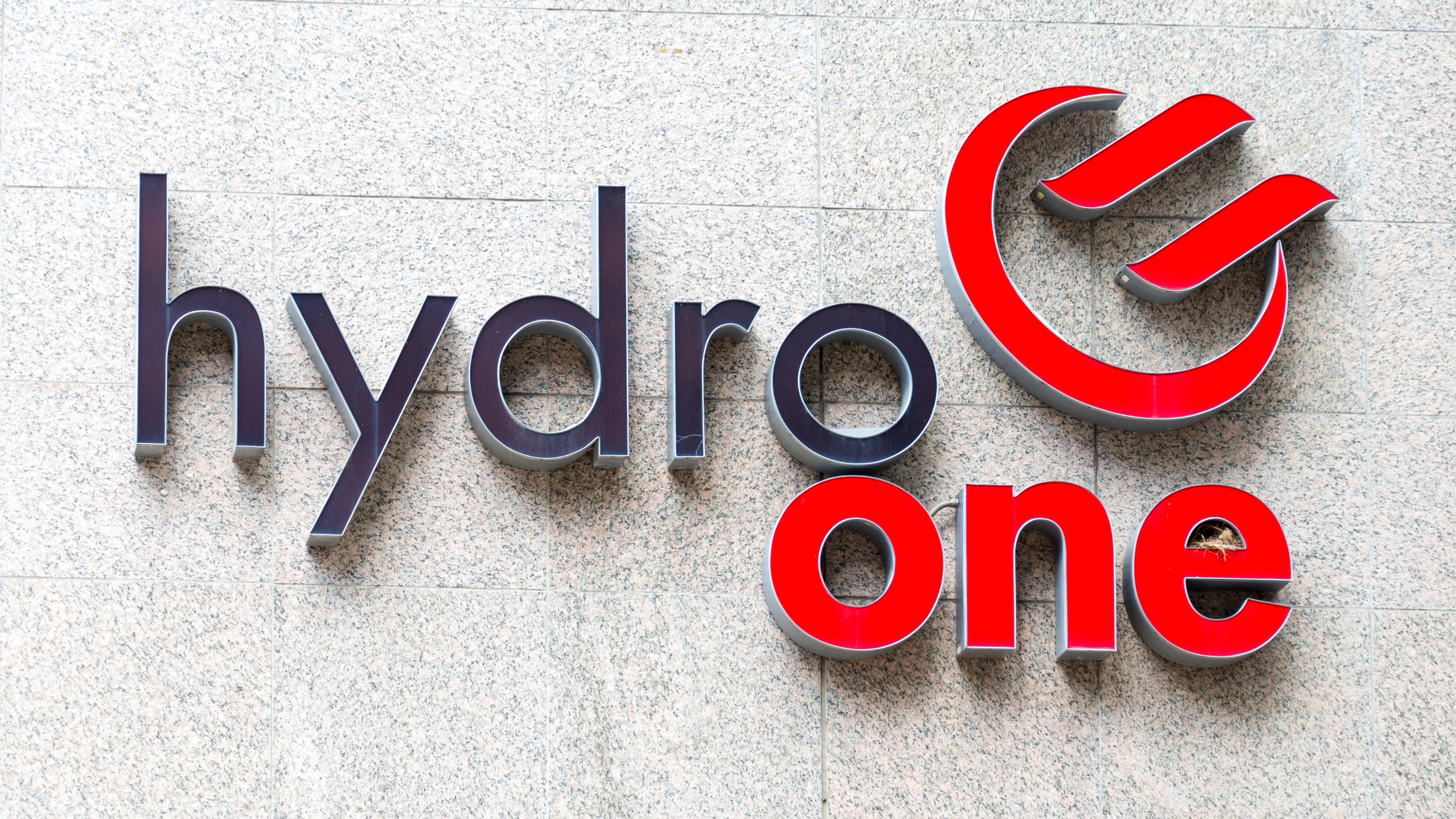 Hydro One sign in the building headquarters wall.