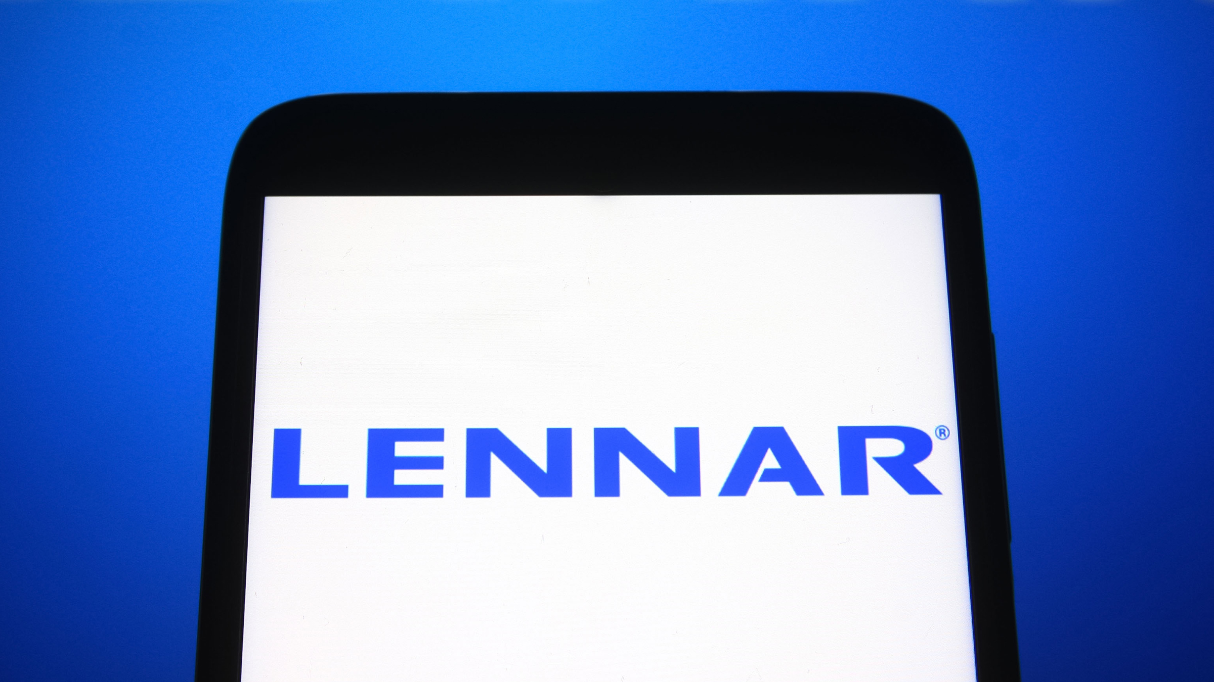 A Lennar logo is seen on a smartphone.