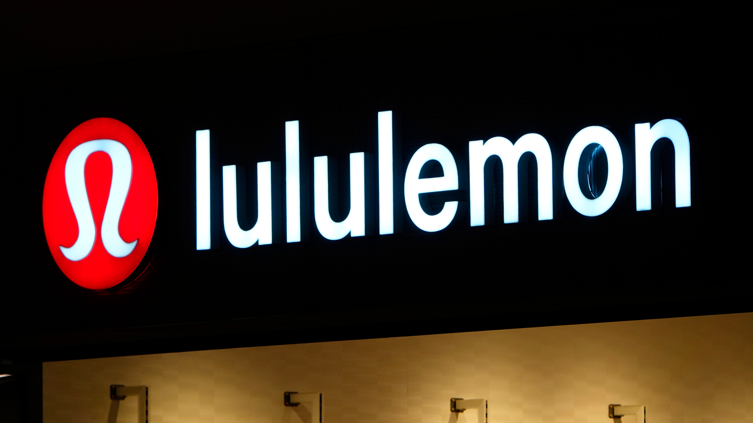 A Lululemon logo is displayed outside their store.