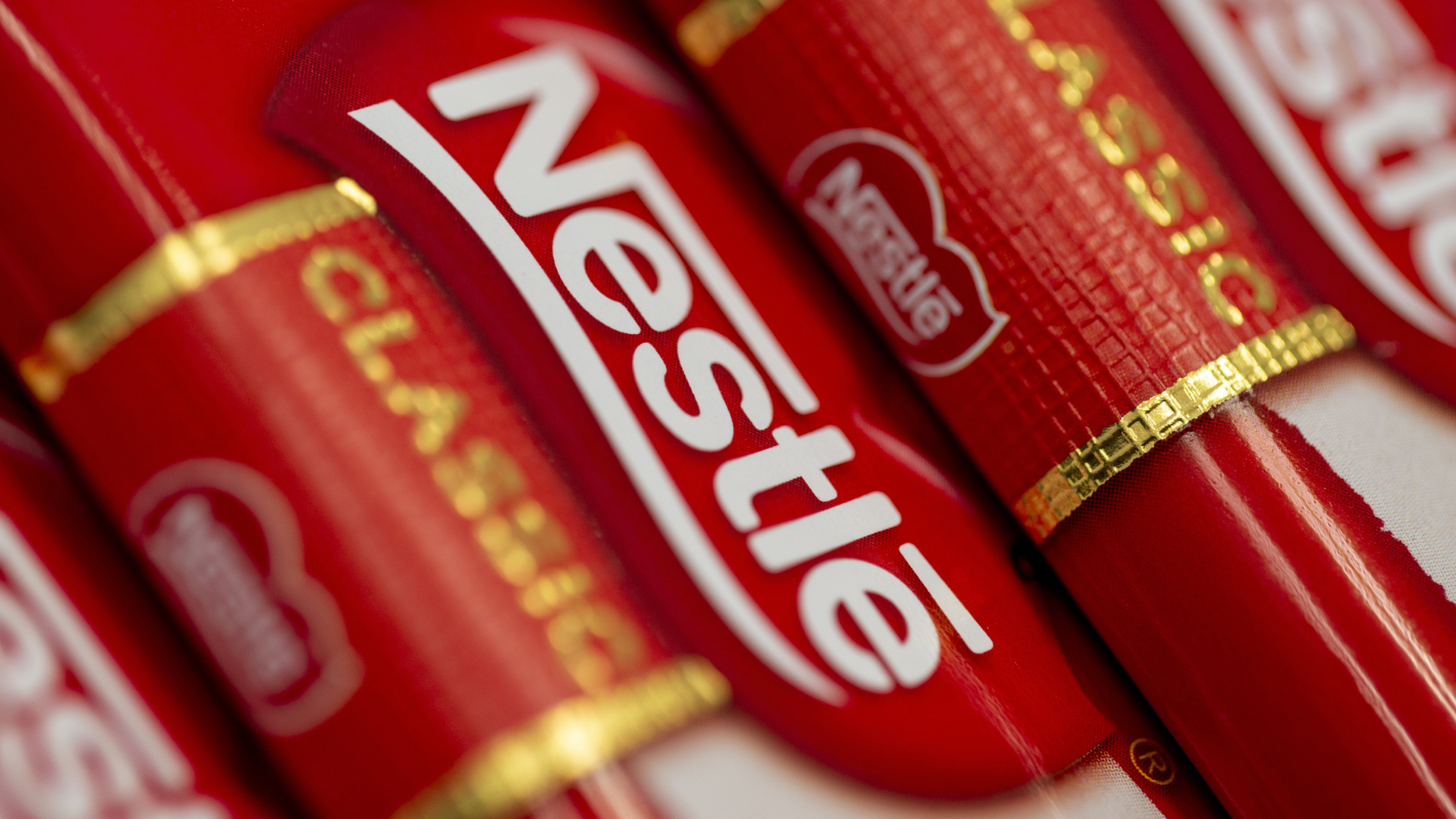 The logo of Nestle are seen on chocolates.