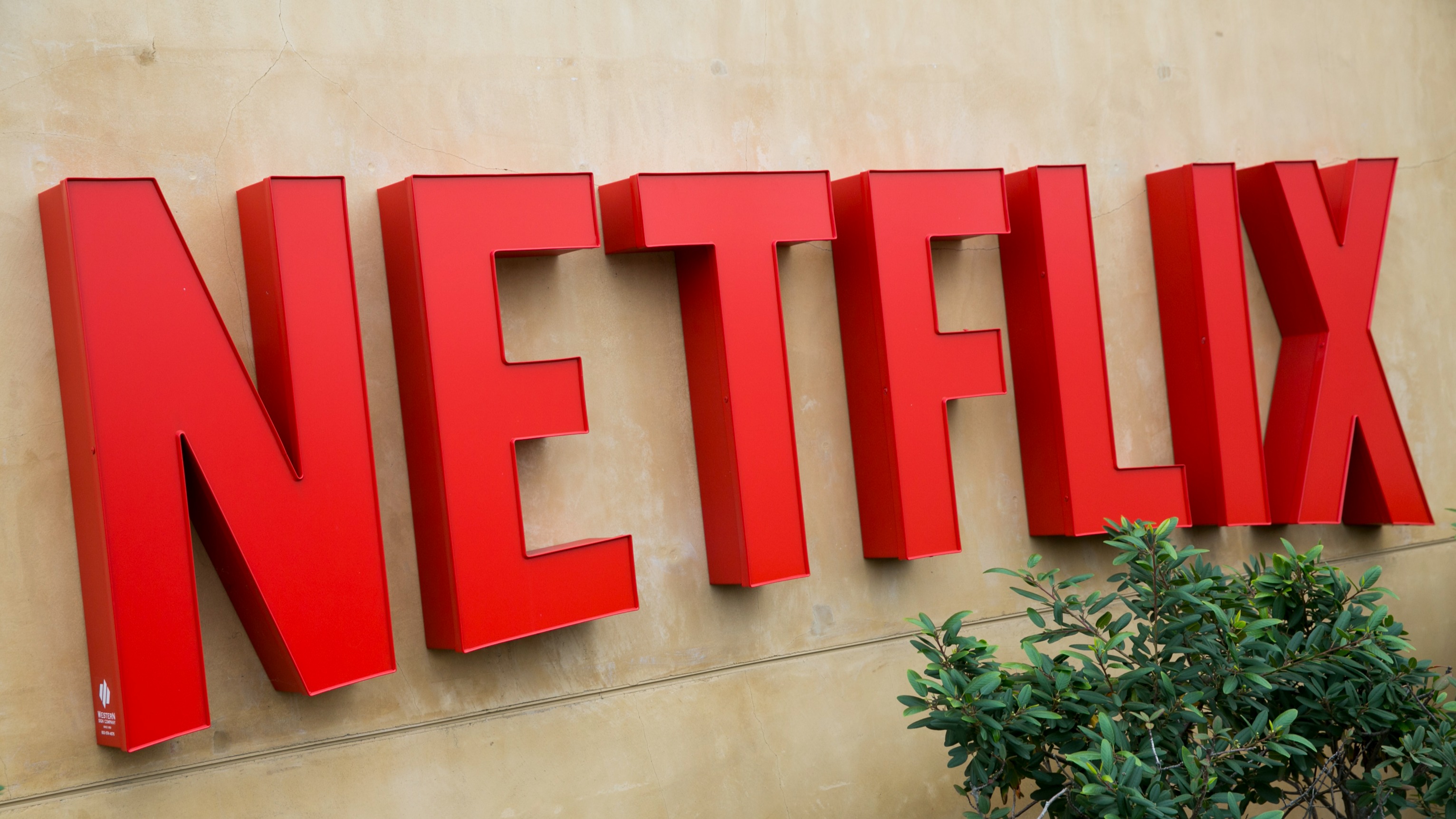 A logo sign outside the headquarters of Netflix, Inc., in Los Gatos, California on December 7, 2014.