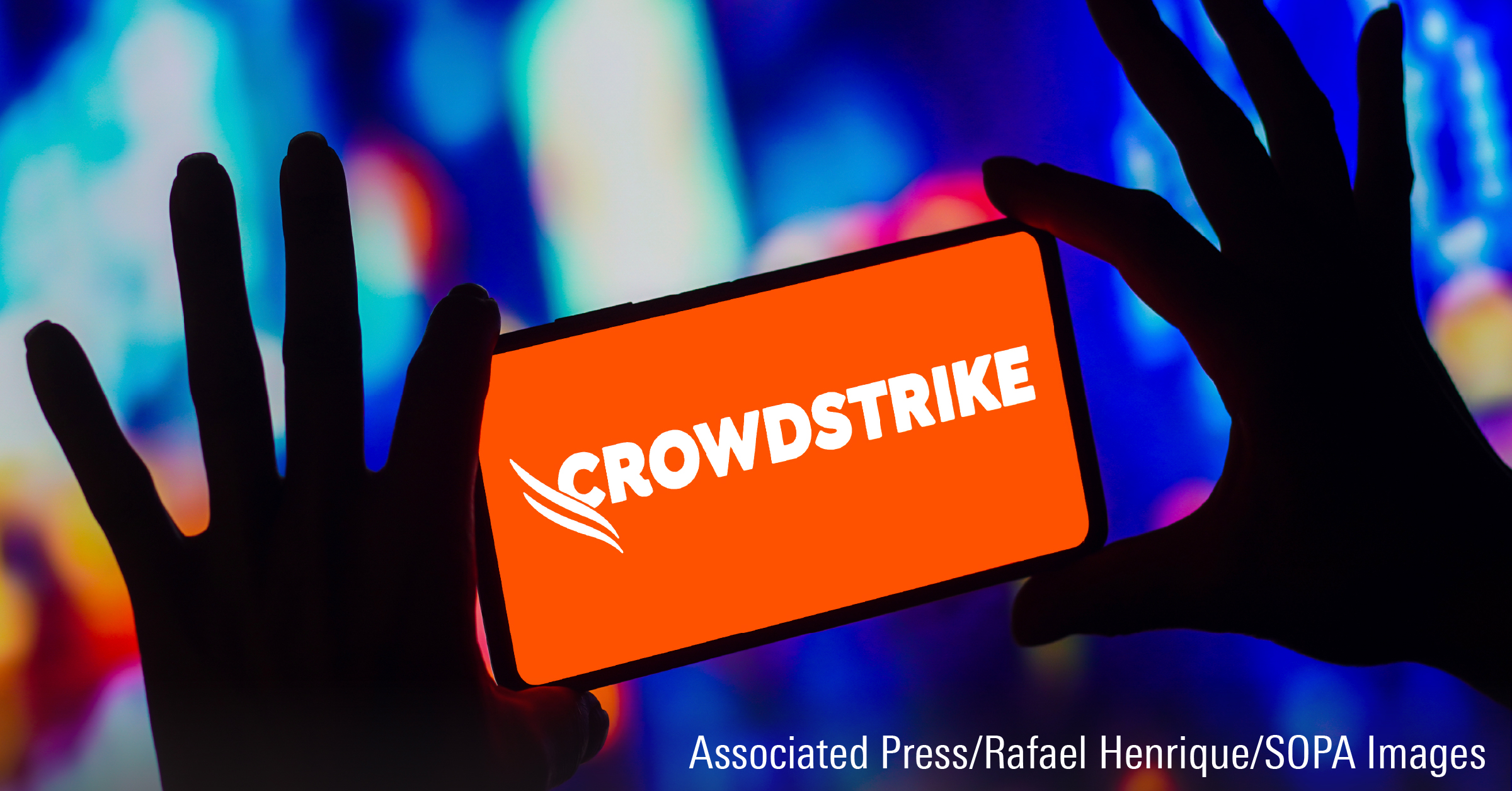 In this photo illustration, the CrowdStrike Holdings logo is displayed on a smartphone screen.