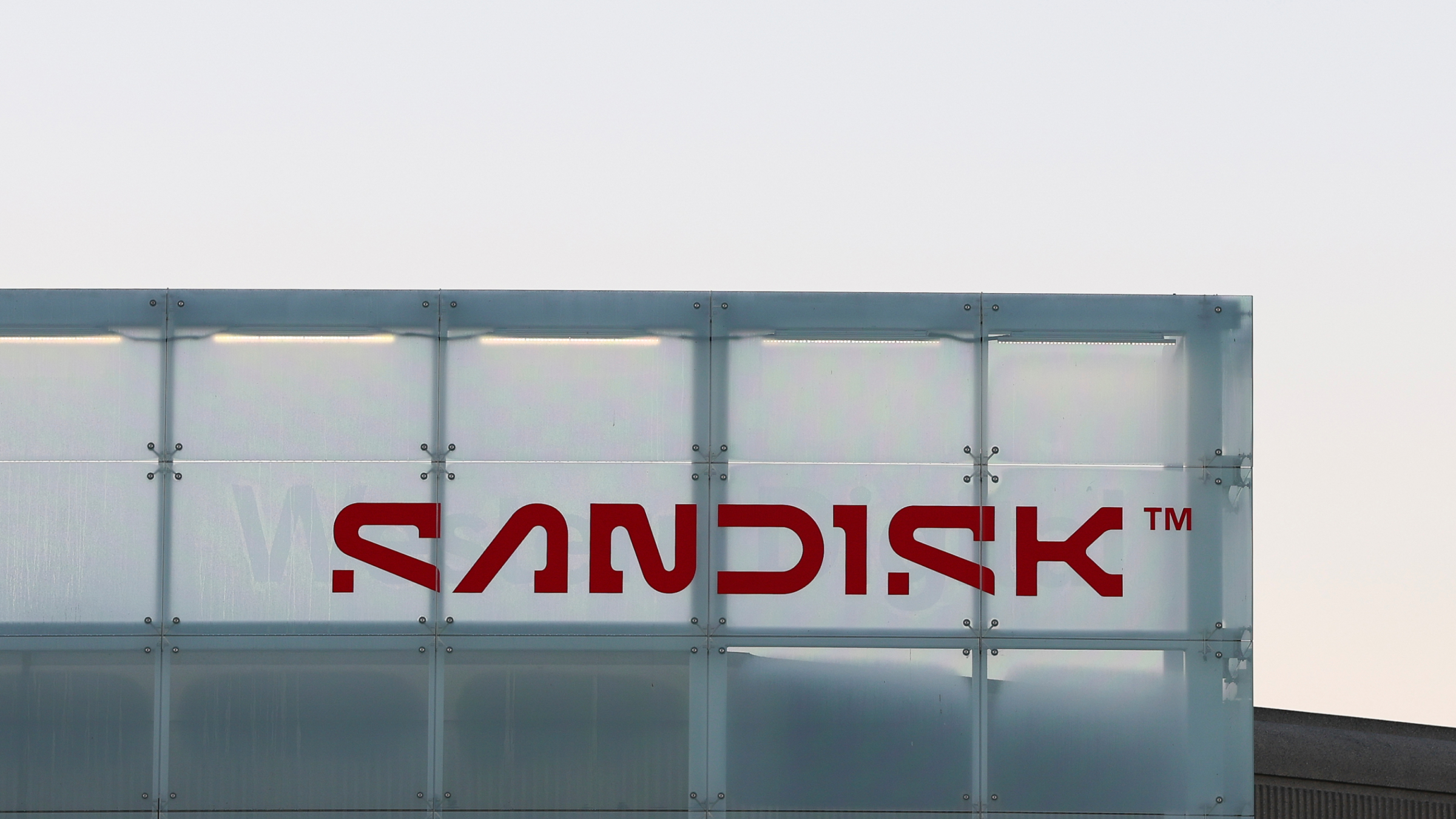 Sandisk signage is displayed outside their headquarters.