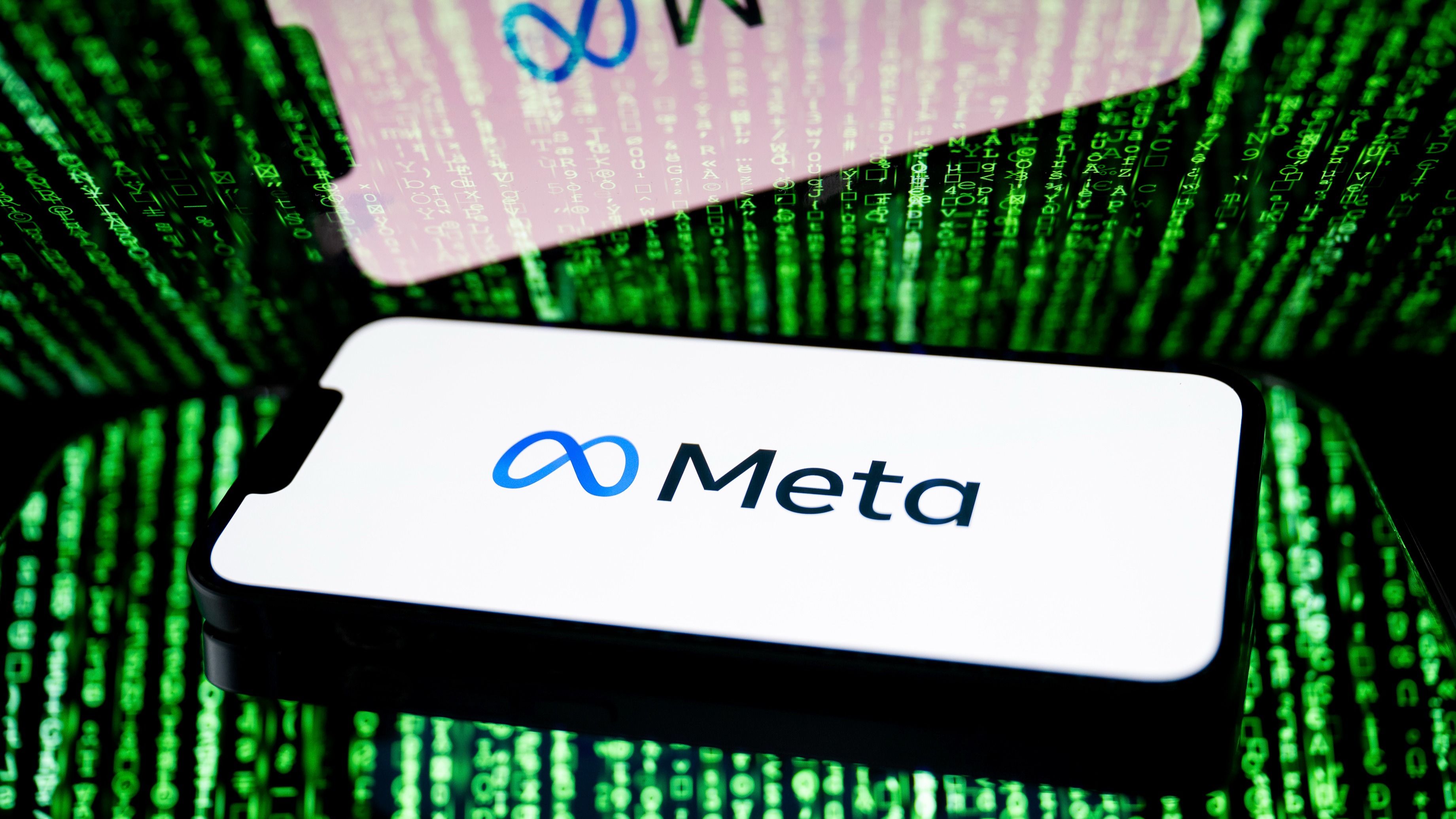 In this photo illustration, a Meta logo seen displayed on a smartphone.