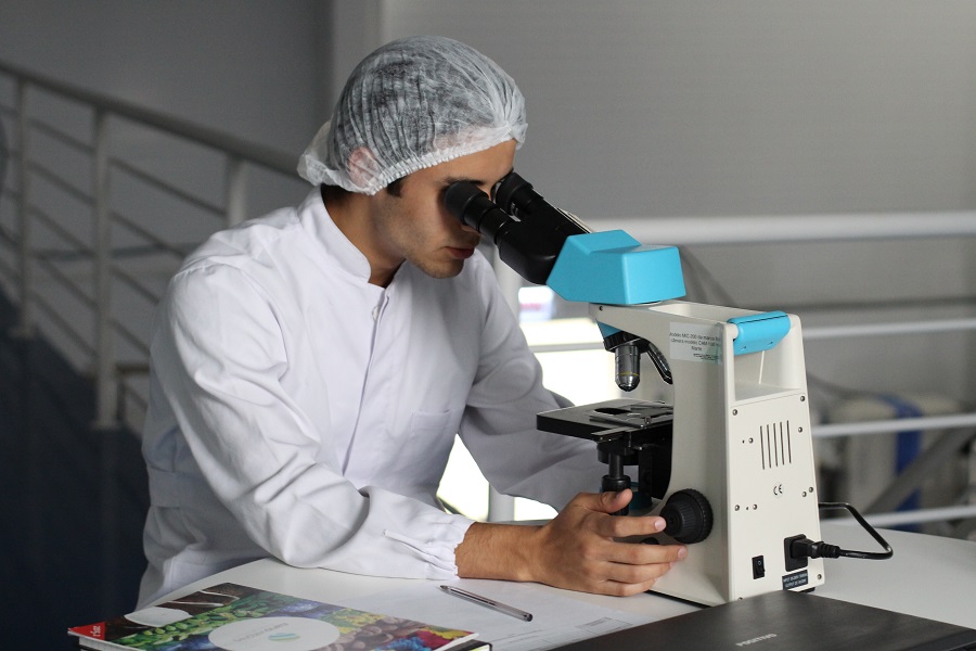 Man with Microscope
