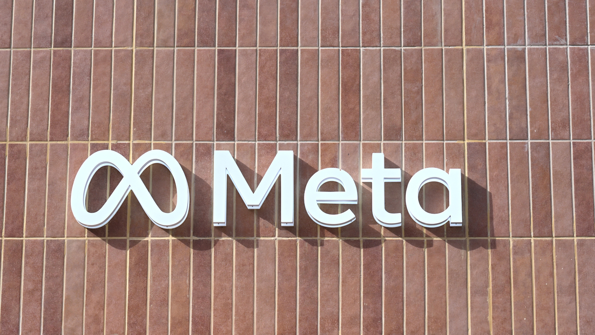 The logo of Meta on a building.