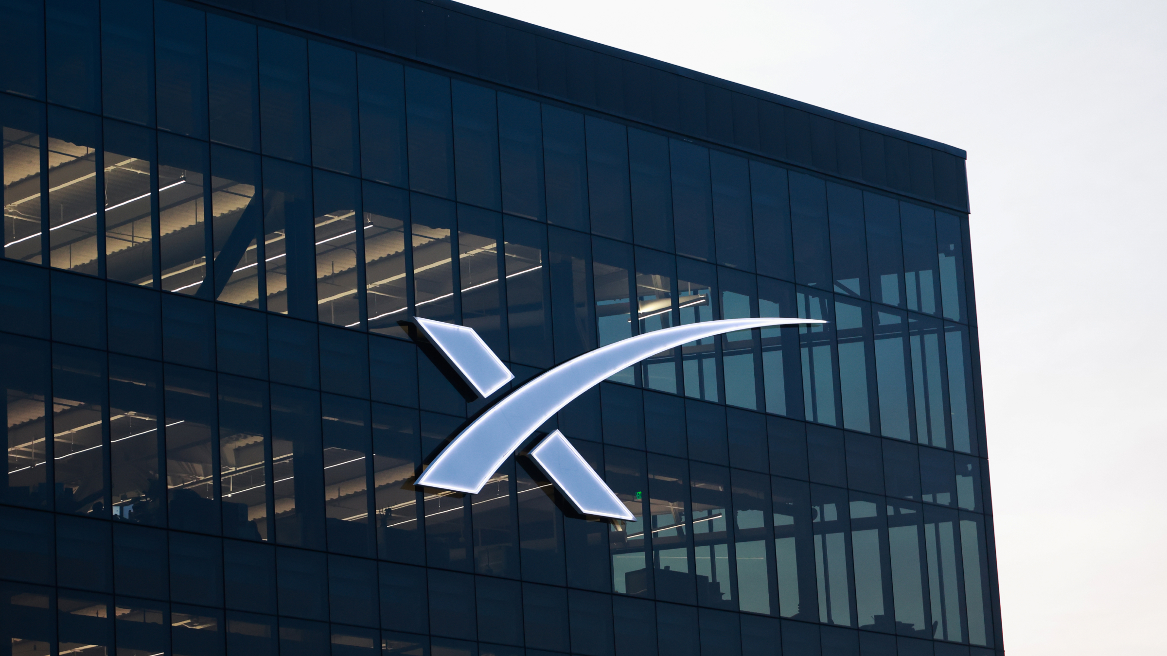 SpaceX's logo is visible on a building at the company's South Texas facility.