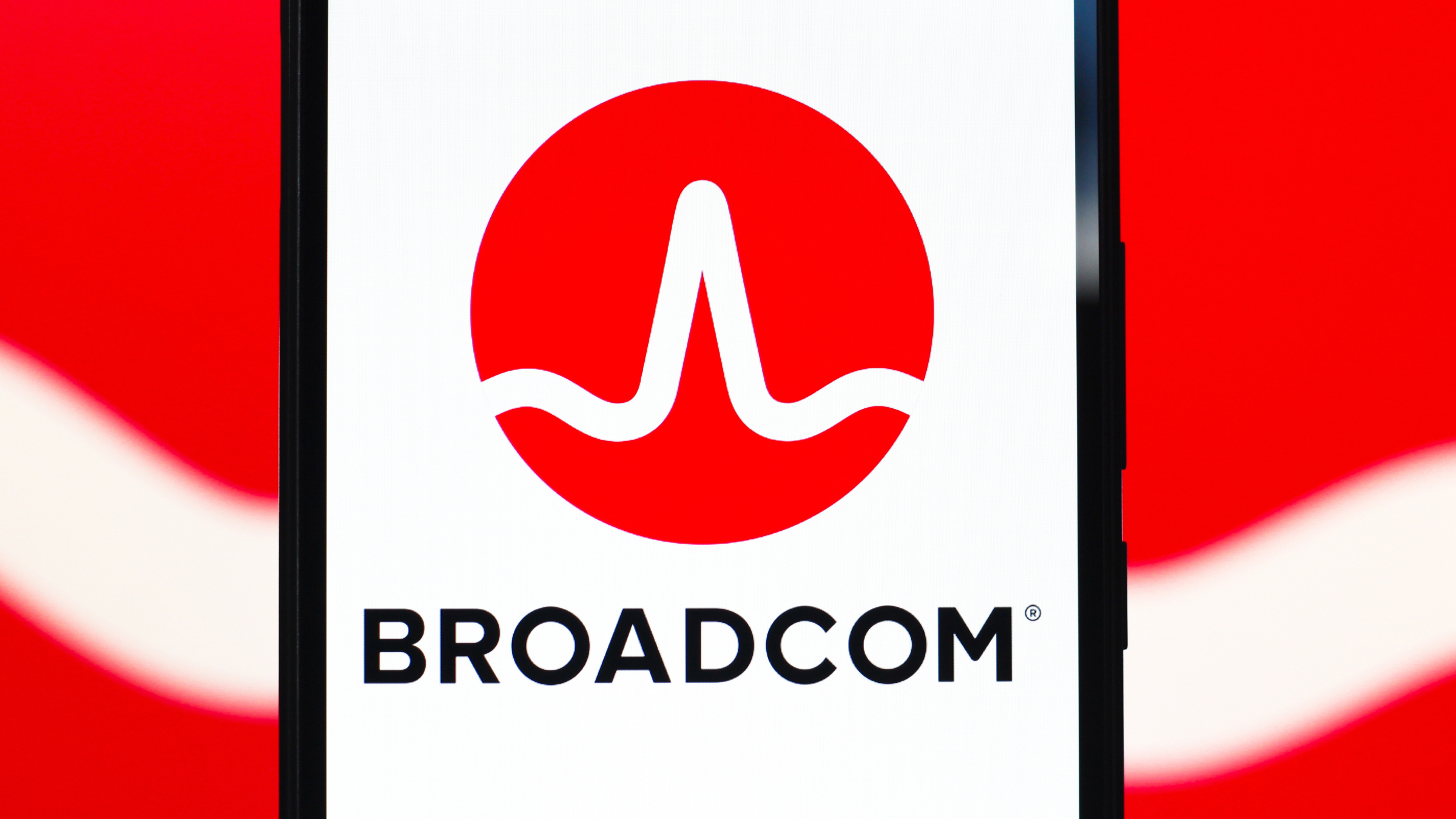 The Broadcom, Inc. logo is seen displayed on a smartphone screen.