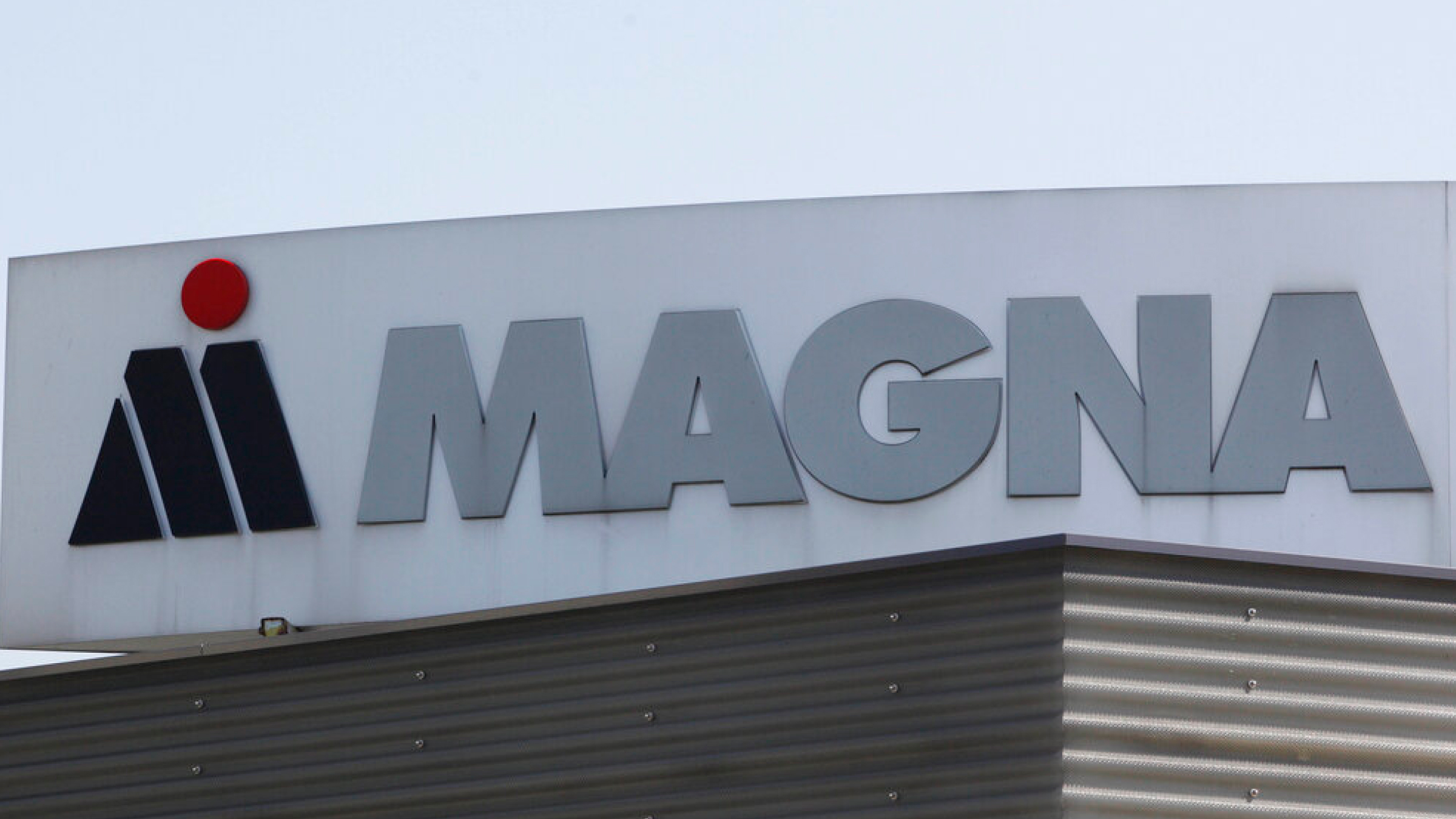 Signage of Magna International on a building.