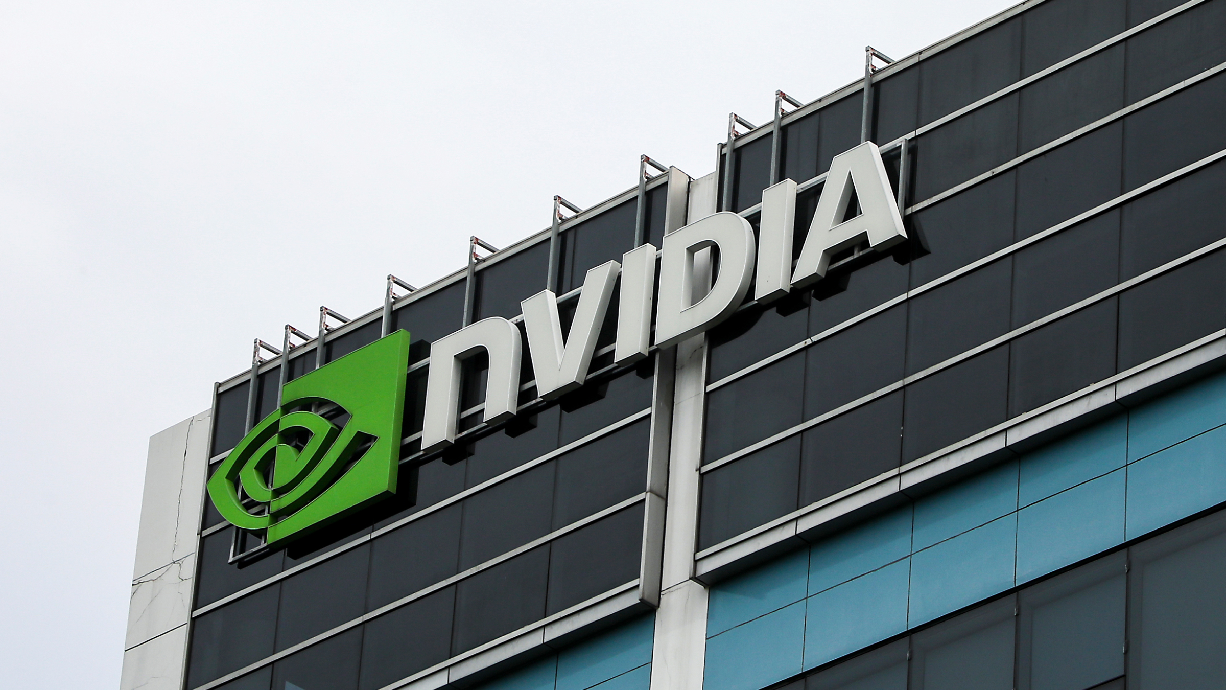 The Nvidia logo on a facade of a building.