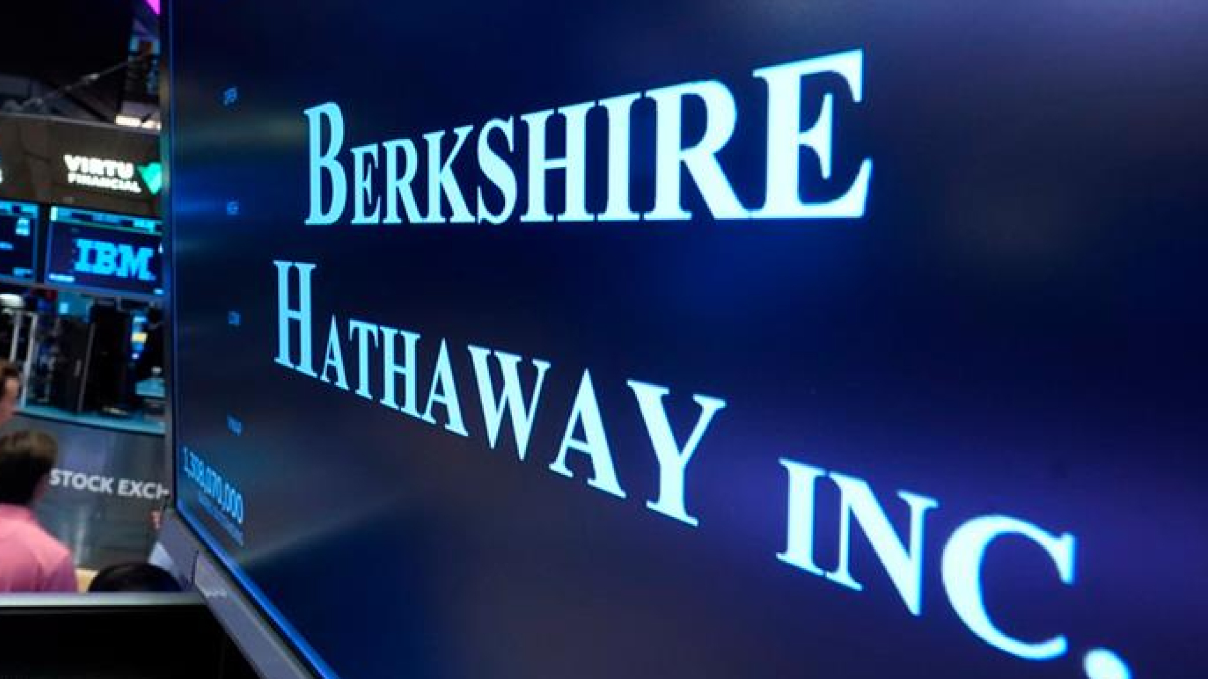 The logo for Berkshire Hathaway Inc. is displayed at a trading post on the floor of the New York Stock Exchange.