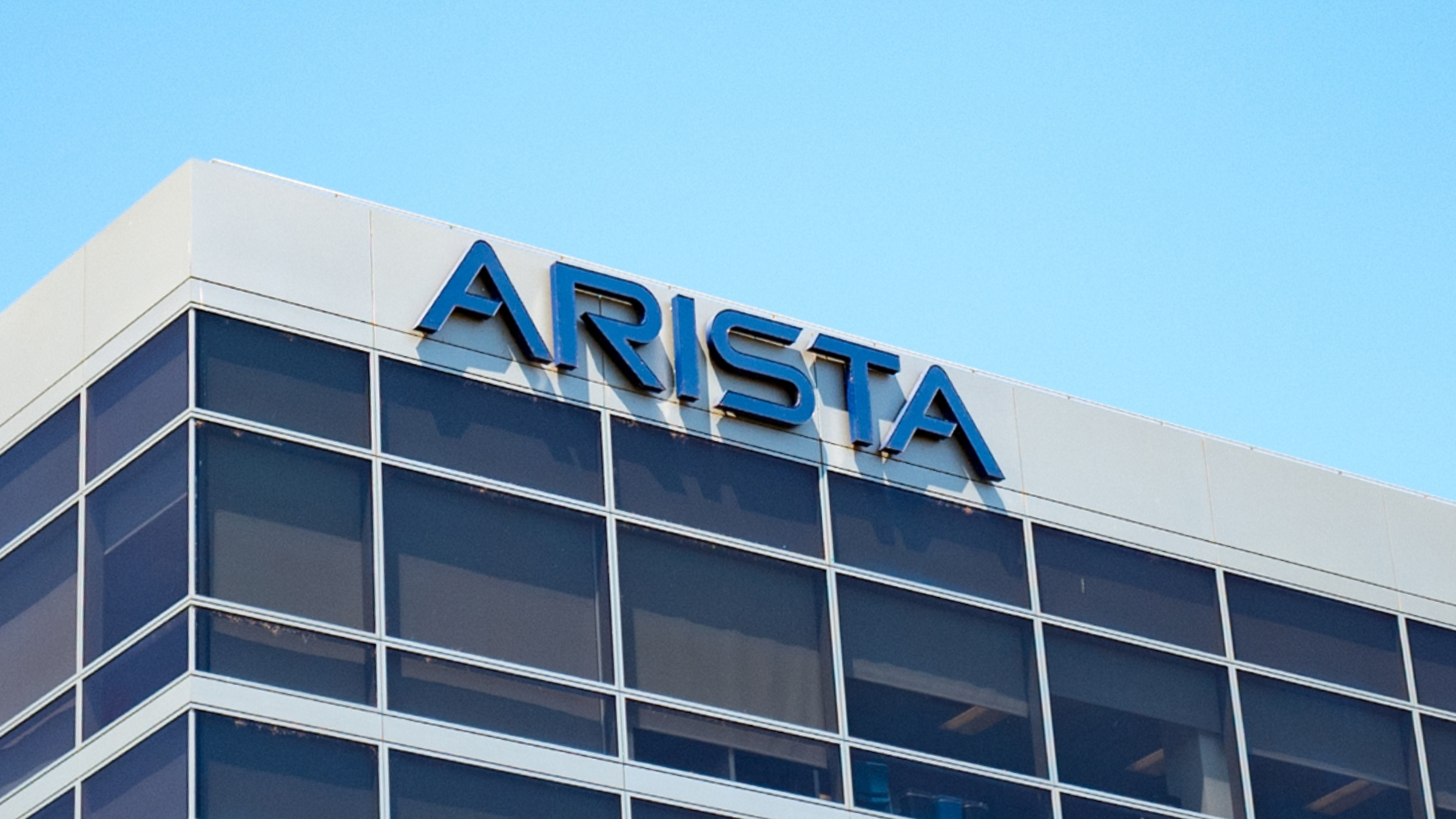 General view of the Arista logo on a building.