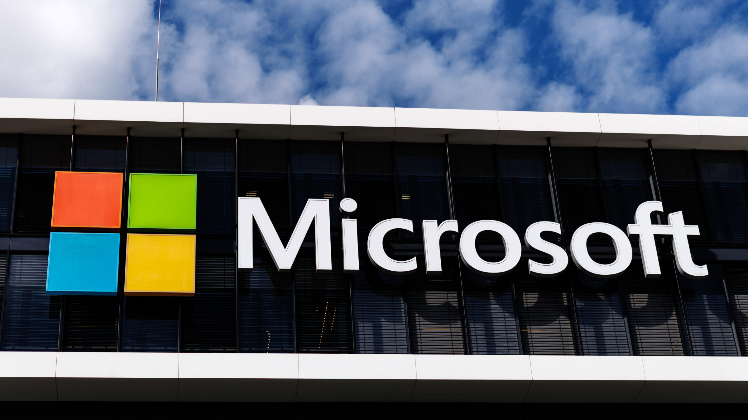 The Microsoft logo displayed on a building.