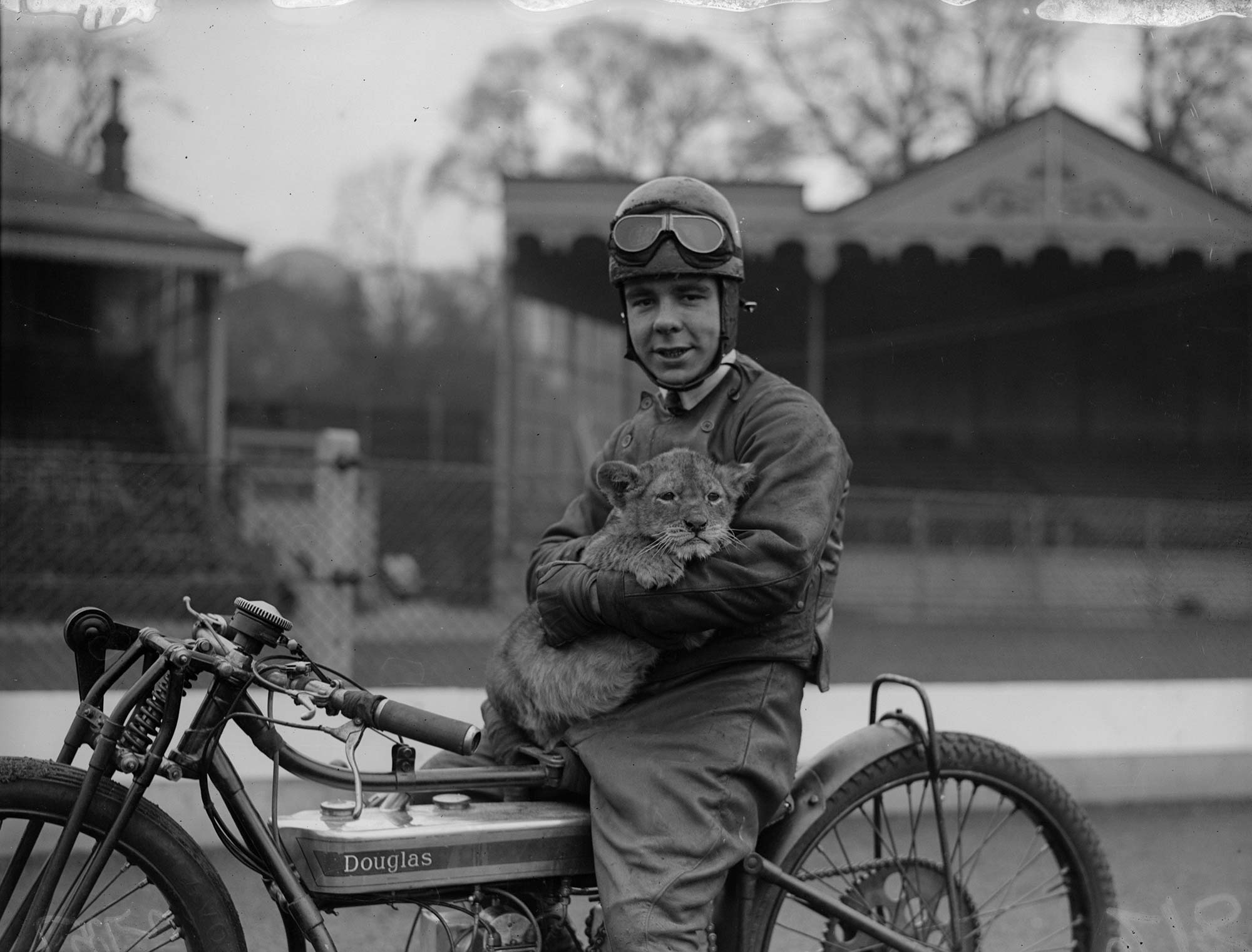 Back in 1930, rider Triss Sharp would take his pet lion cub along on his motorcycle!